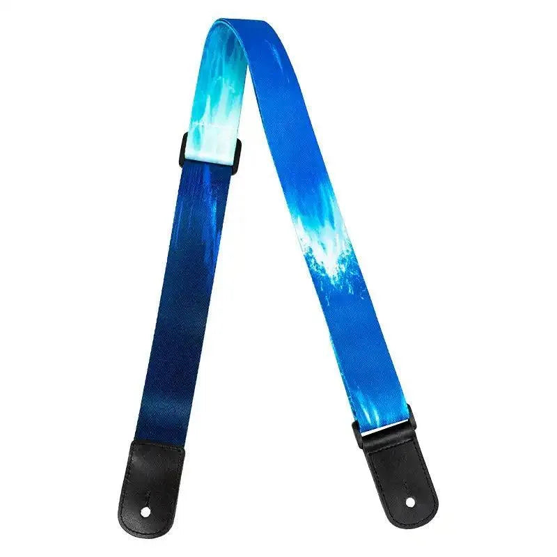 Flight S35 Surf polyester ukulele strap with blue ocean wave design and black leather ends.