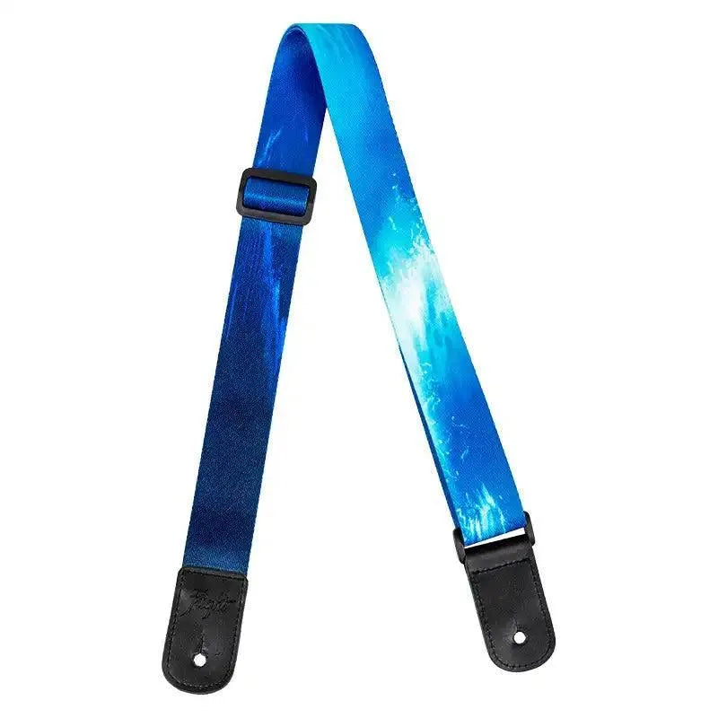 Flight S35 Surf polyester ukulele strap with blue ocean wave design and black leather ends.