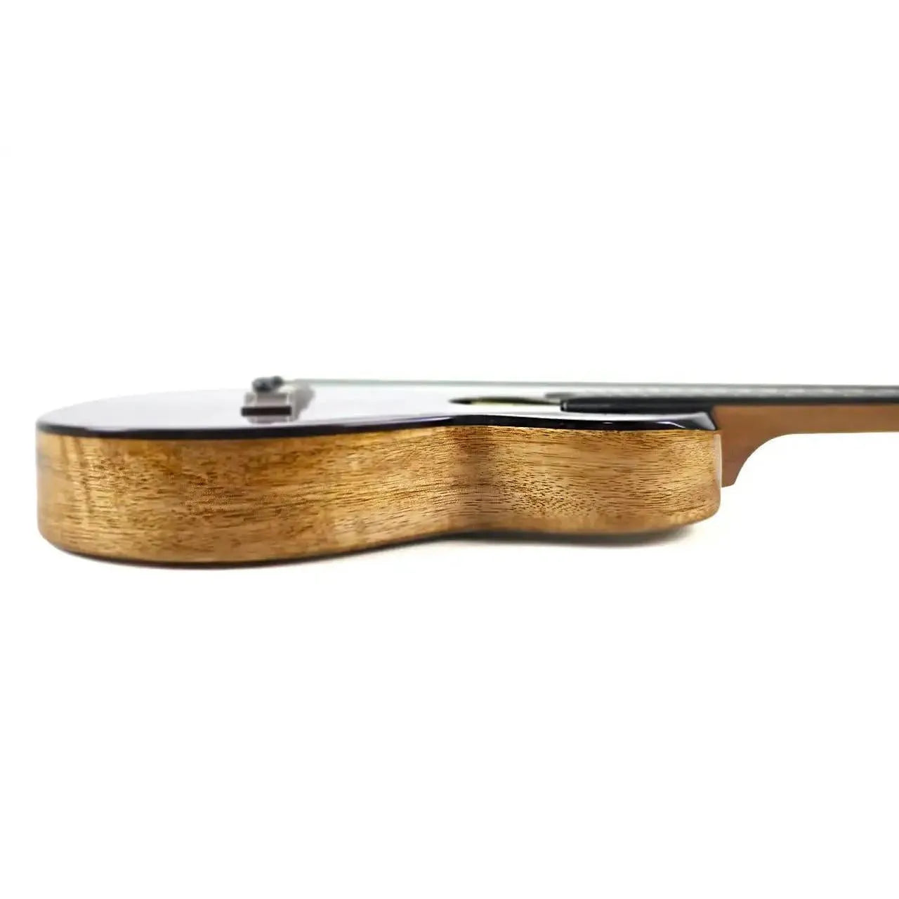 Flight Songbird TPP transparent purple slimline tenor ukulele, showing its solid mango wood side.