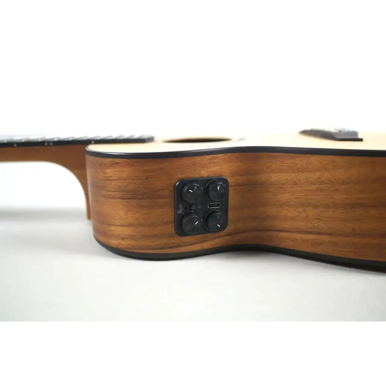 Flight Victoria Soundwave Tenor Ukulele with natural wood finish, showing the built-in pickup controls.
