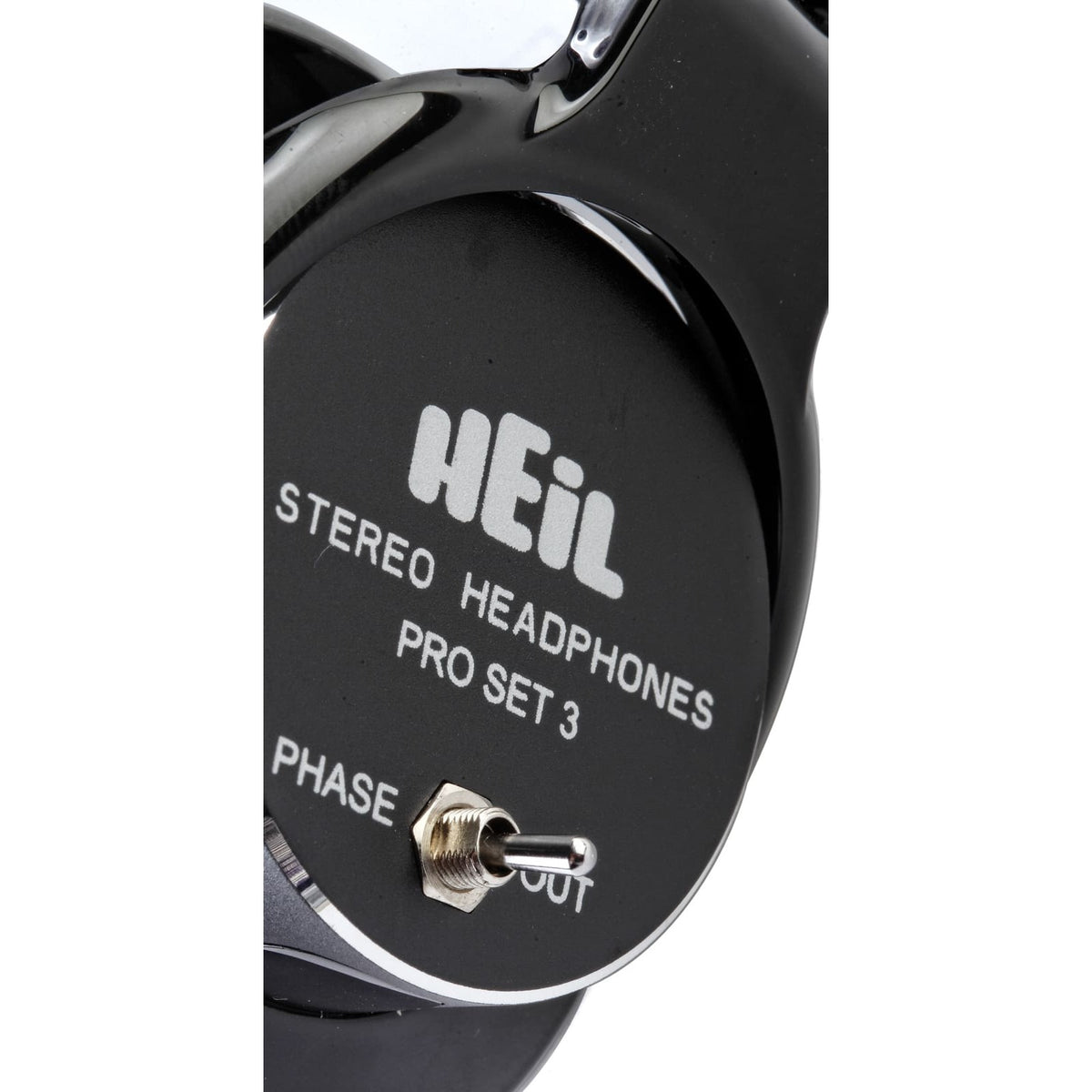 Close-up of the Heil Sound Pro Set 3 ear cup showing the phase in/out switch