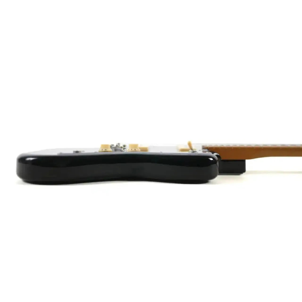 Side view of a black Jet JJ-300 P90 offset electric guitar body with a brown neck.