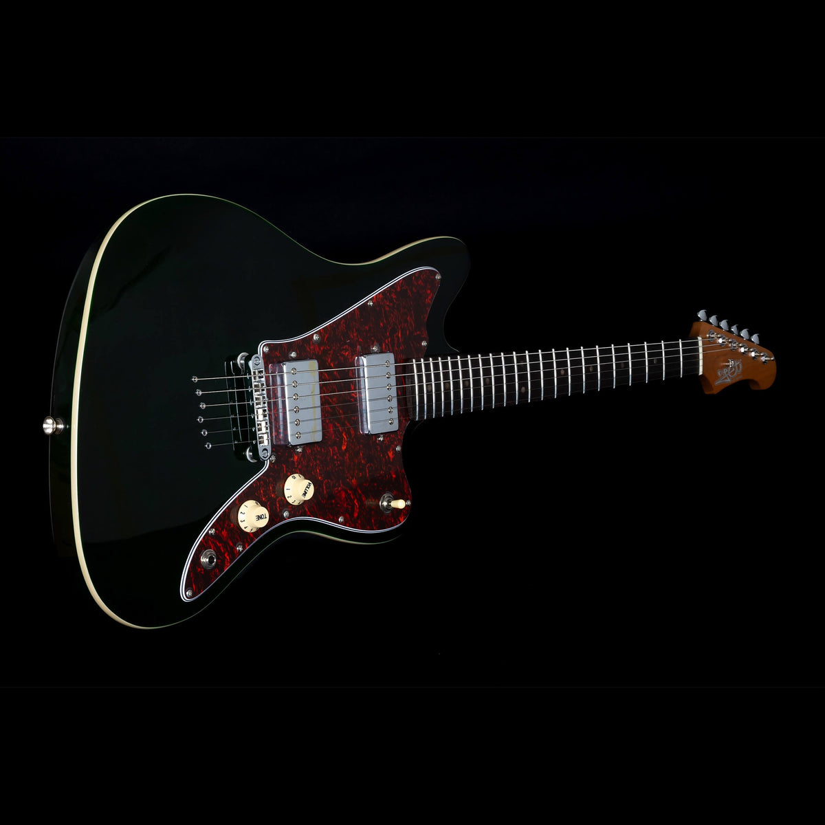 Jet JJ-350 GR R green offset electric guitar lying flat, back view with roasted maple neck.