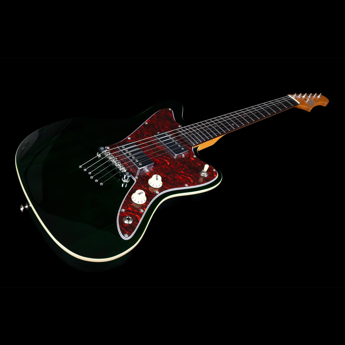 Jet JJ-350 GR R green offset electric guitar body at an angle showing the red tortoise pickguard and cream binding.