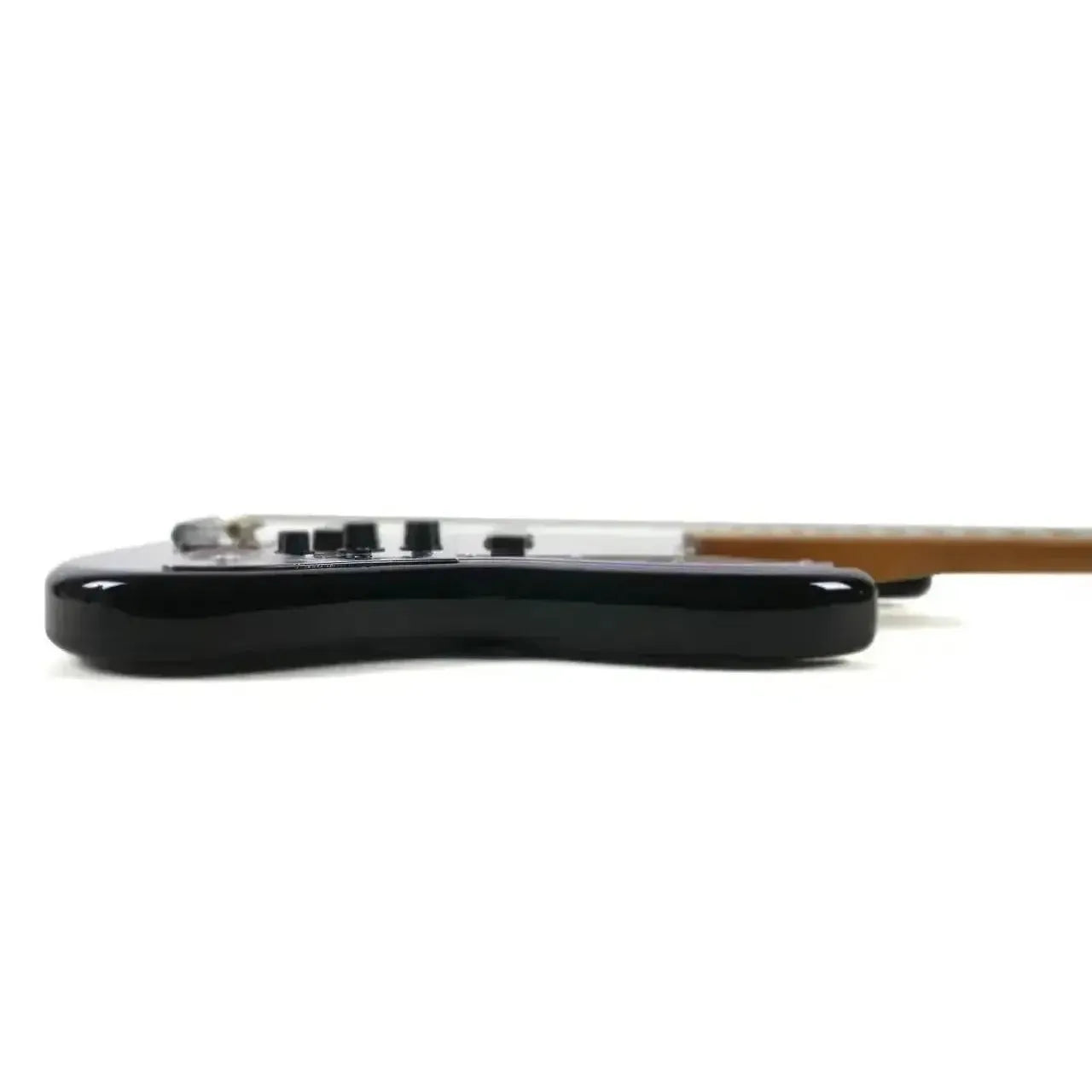 Side view of a Jet JJB-300 SB electric bass with a glossy black body and light wood neck.