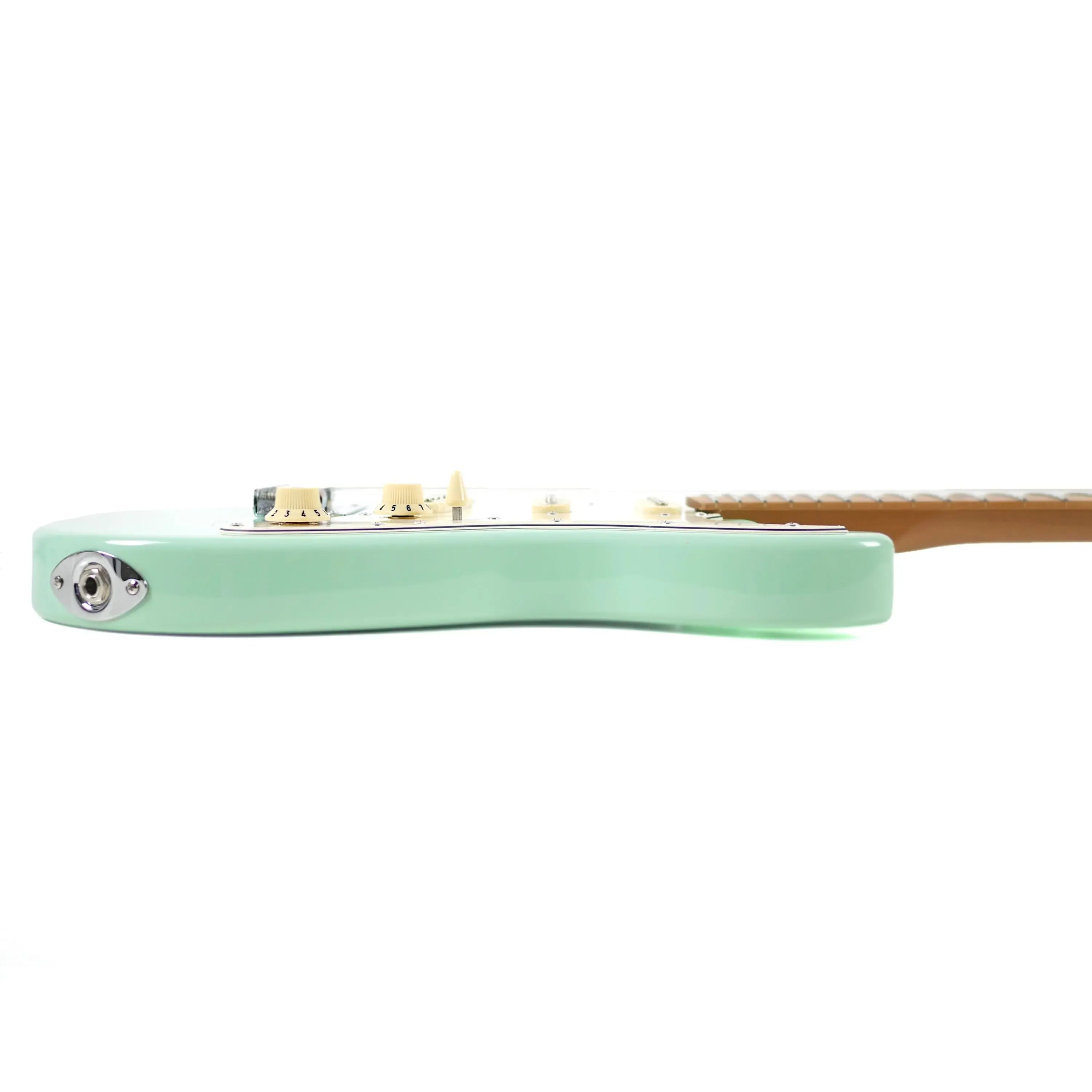 Jet JS-300 MINI Seafoam Green Stratocaster electric guitar body with input jack and controls.