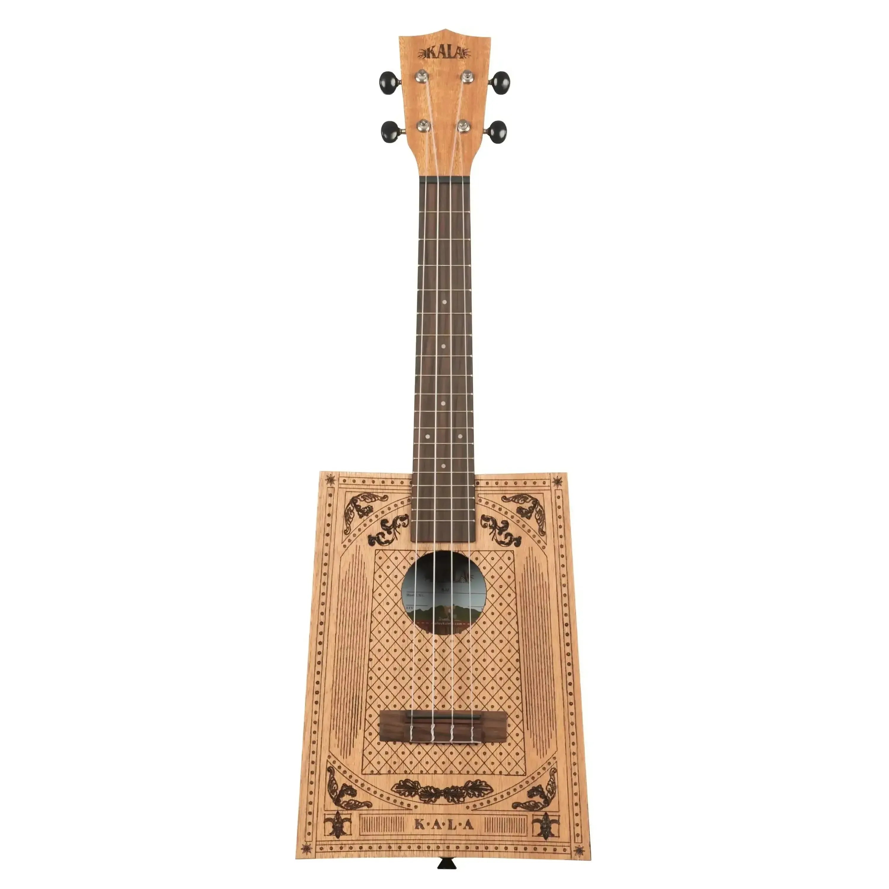 Kala Victorian Cigarbox Concert Ukulele with ornate laser-etched design on light wood.