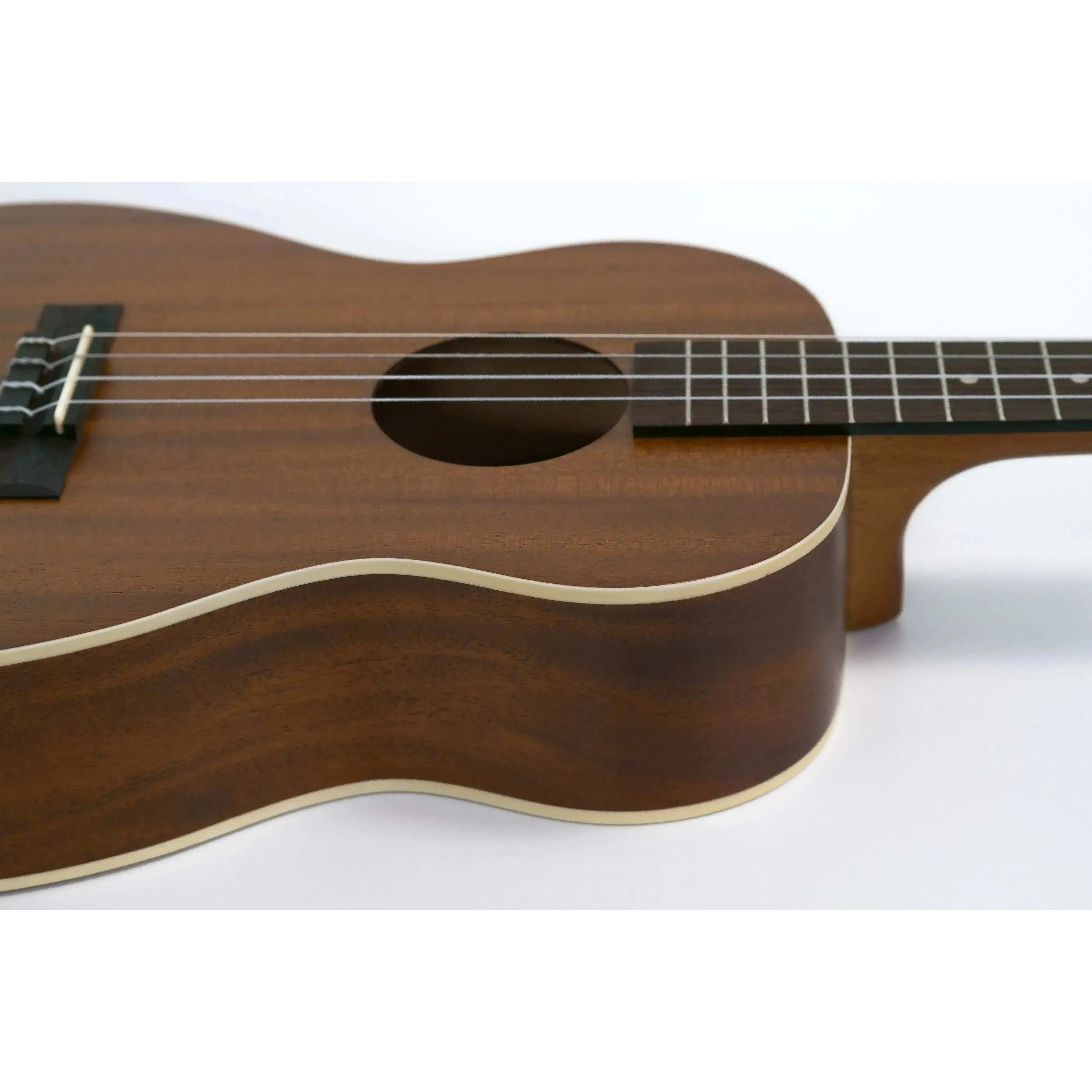Kala KA-B Baritone Ukulele, satin mahogany body with cream binding and dark fretboard.