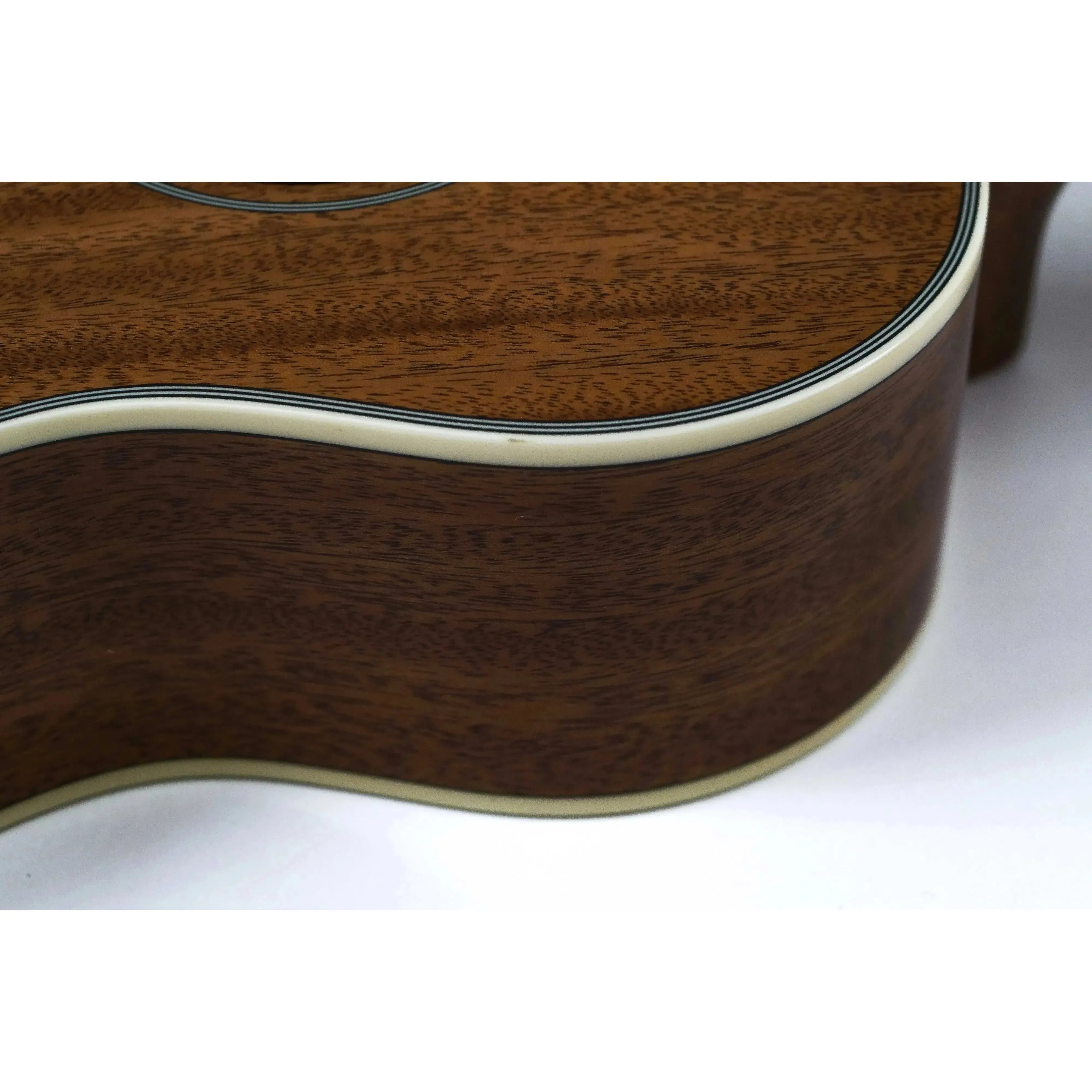 Kala Gloss Mahogany Baritone Ukulele body with cream binding and dark wood grain.