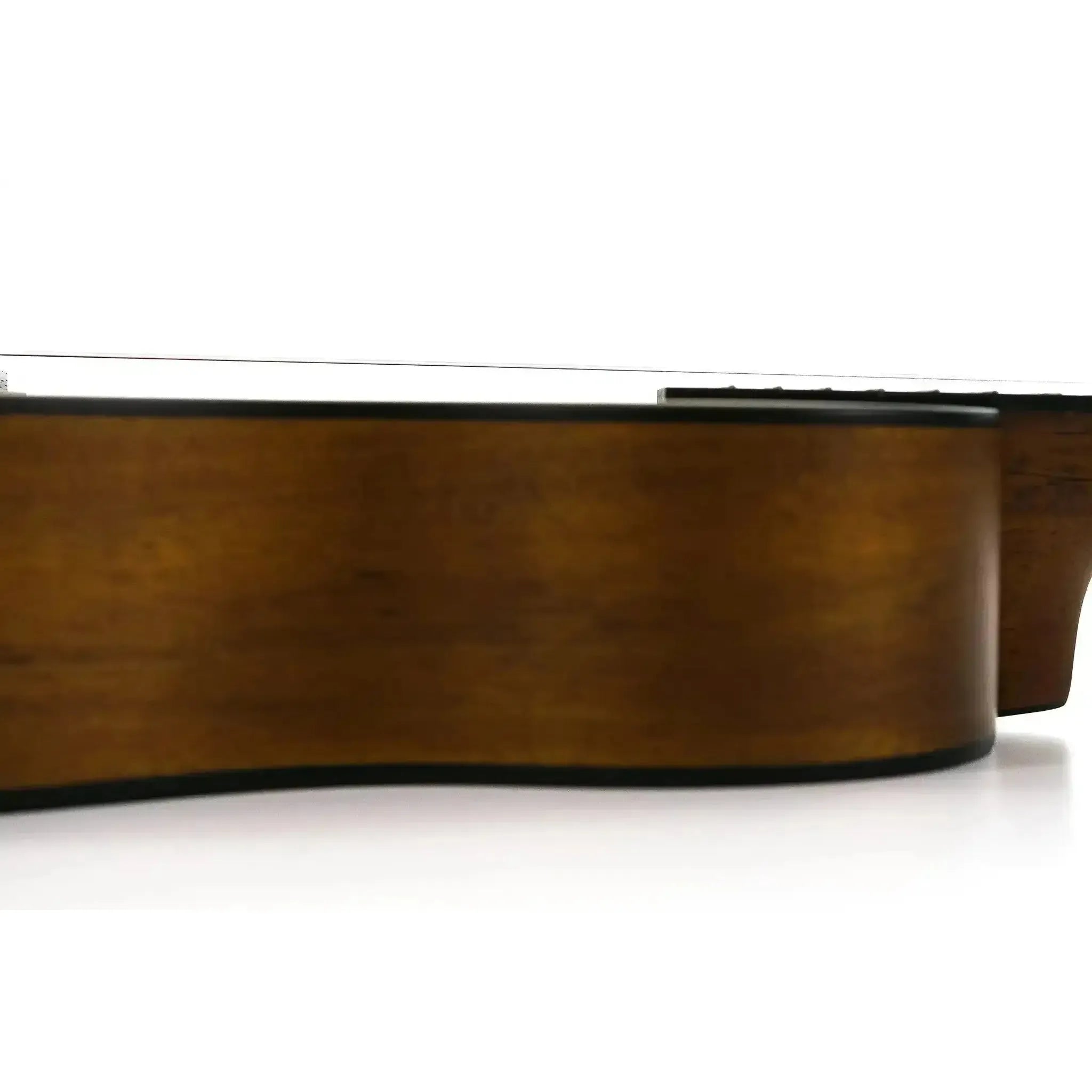 Kala Hawaiian Koa Baritone Ukulele side view, showing its dark brown koa wood body and black binding.