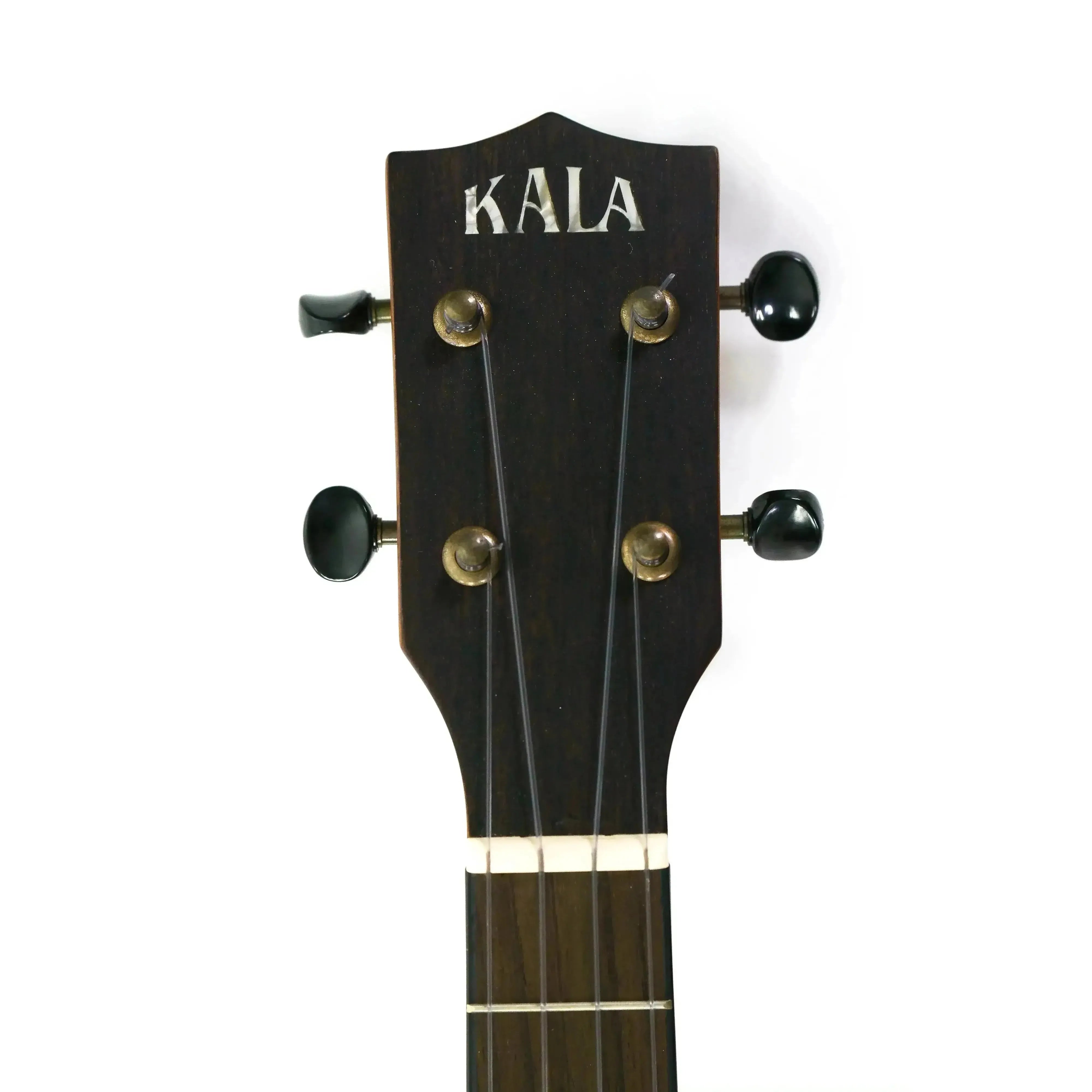 Kala ukulele headstock with dark wood, white KALA logo, and black tuning pegs.