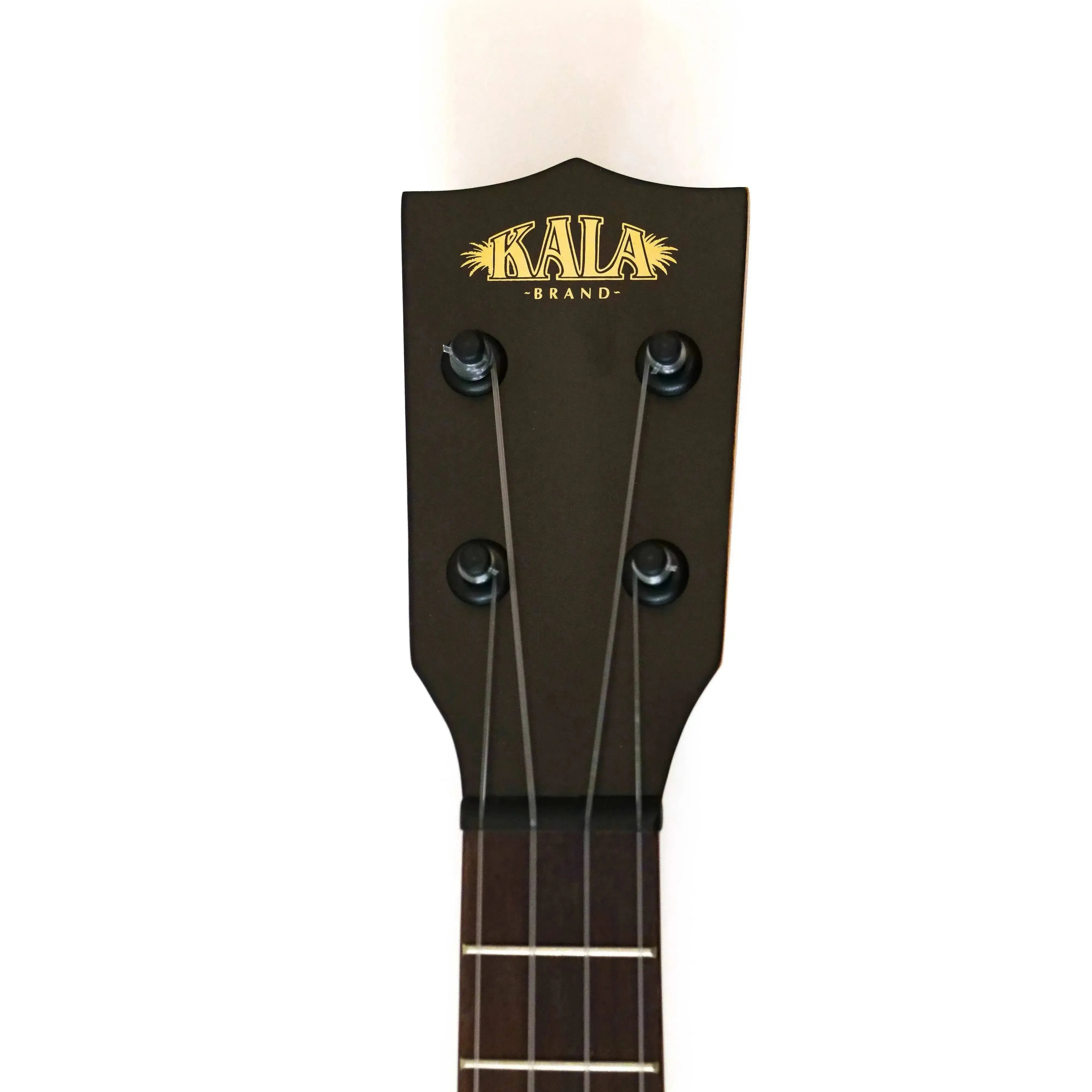 Kala ukulele headstock with gold logo, black tuners, and dark wood fretboard.