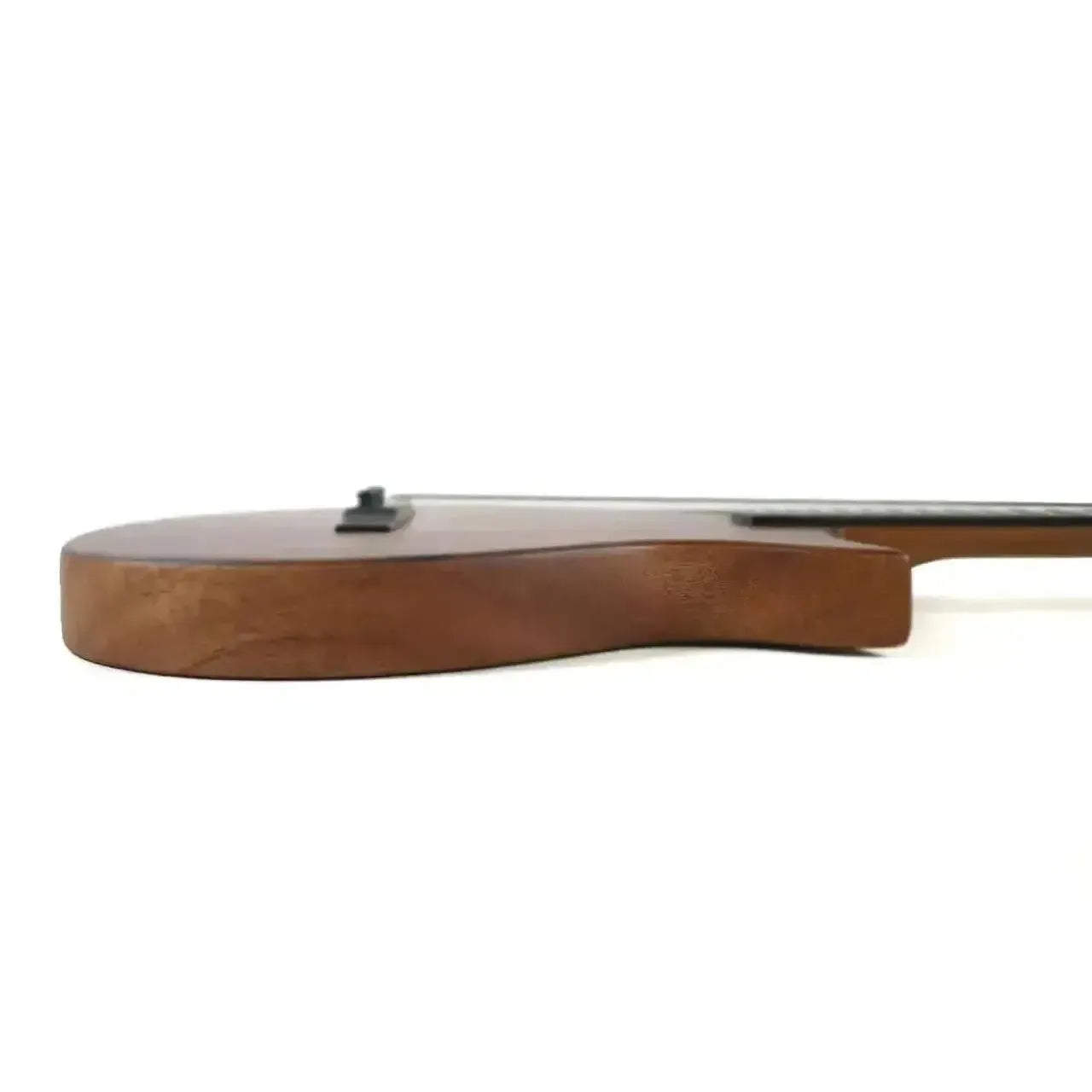 Side view of Kala Revelator Nautilus Baritone Ukulele, showing its Hawaiian Koa body and Florentine cutaway.
