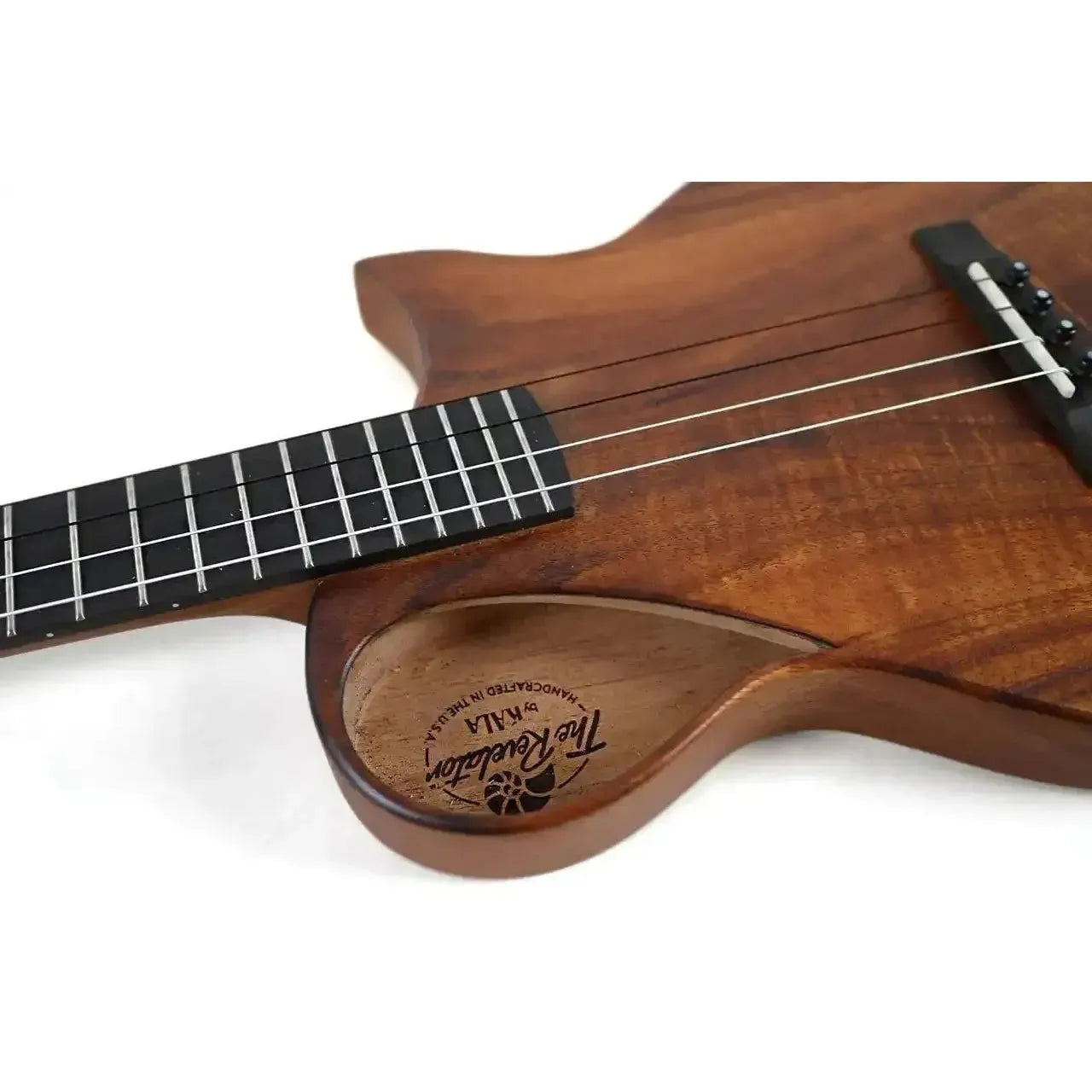 Kala Revelator Nautilus Hawaiian Koa Baritone Ukulele body with Florentine cutaway and soundhole.