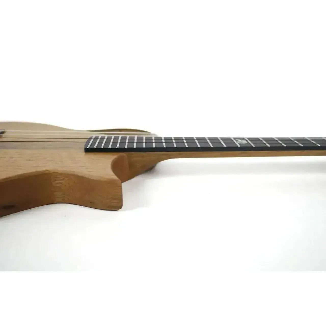 Kala Revelator Nautilus Mastergrade Korina Tenor Ukulele with Florentine cutaway and ebony fingerboard.