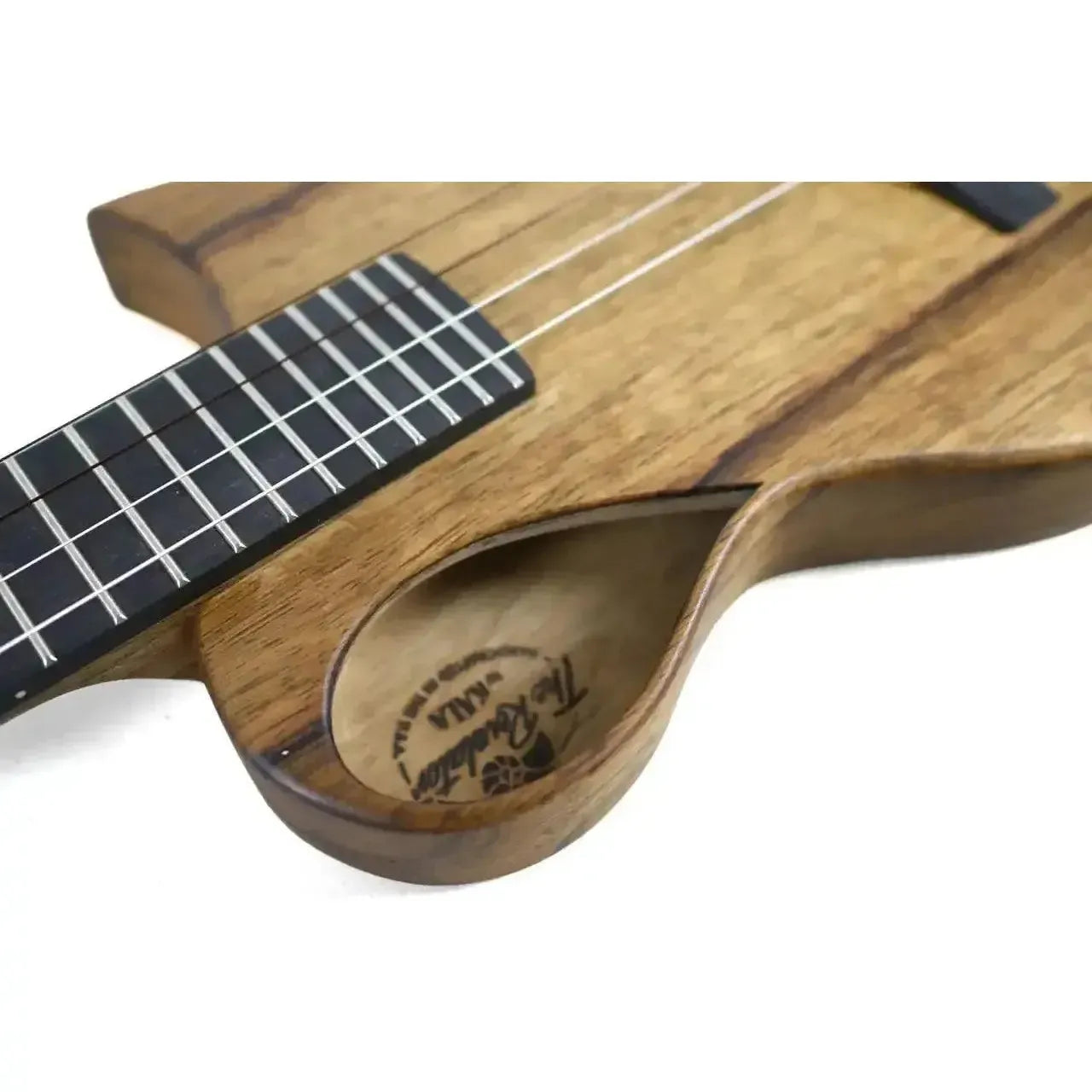 Kala Revelator Nautilus Korina tenor ukulele with unique Florentine cutaway and dark fretboard.