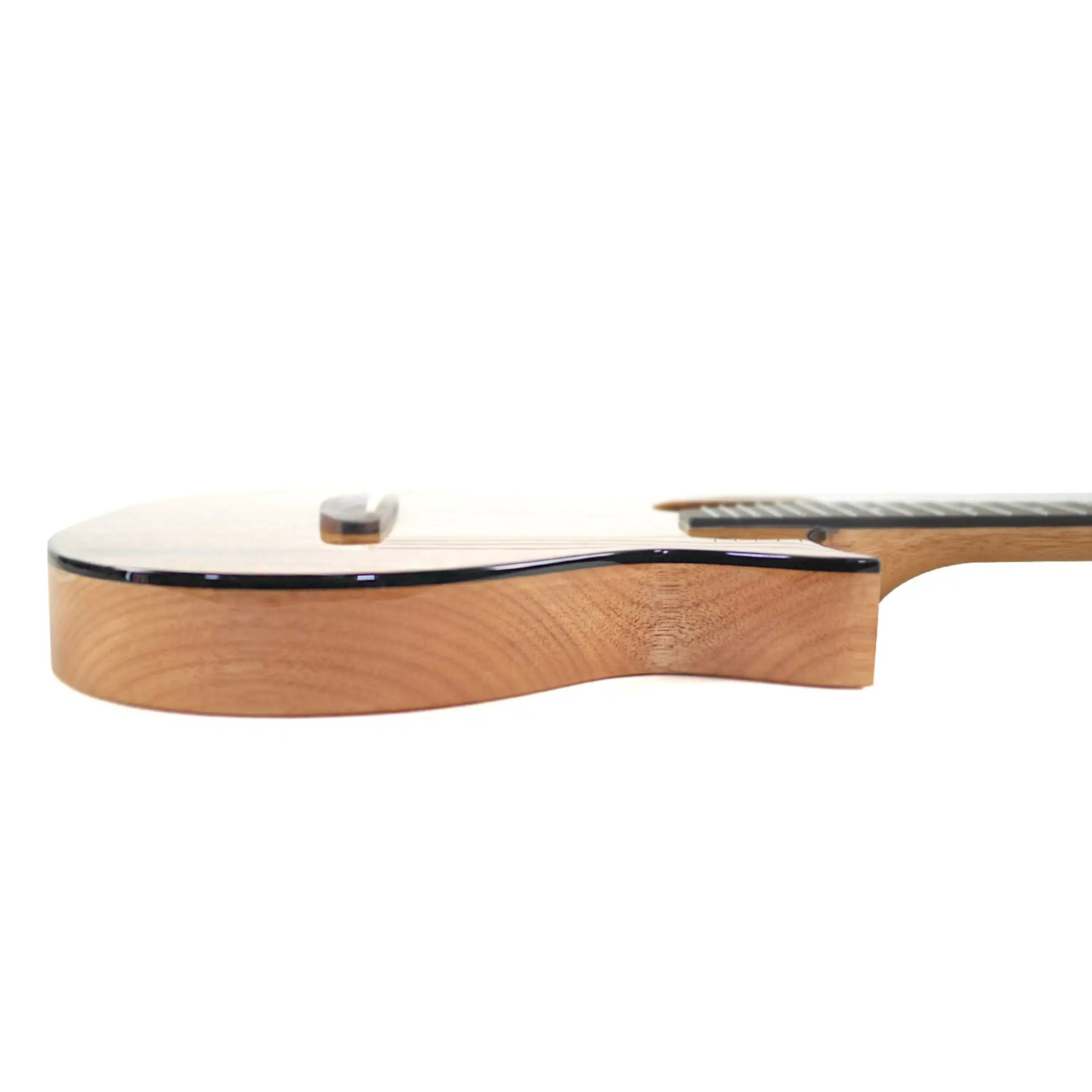 Side view of Kala Revelator Night Owl Mango Tenor Ukulele with Florentine cutaway and gloss finish.