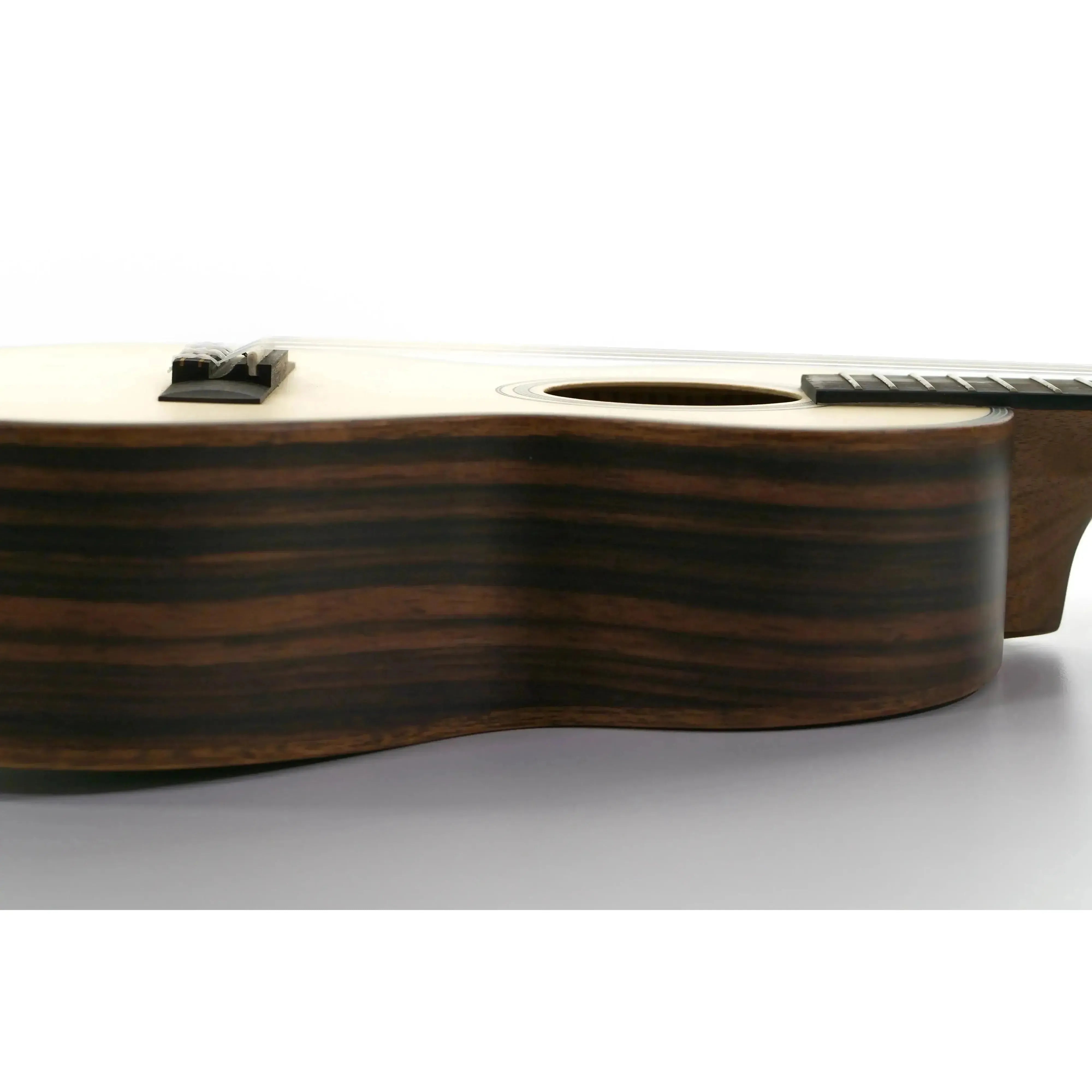 Kala SSEBY-T Tenor Ukulele with solid spruce top and striped ebony back and sides.