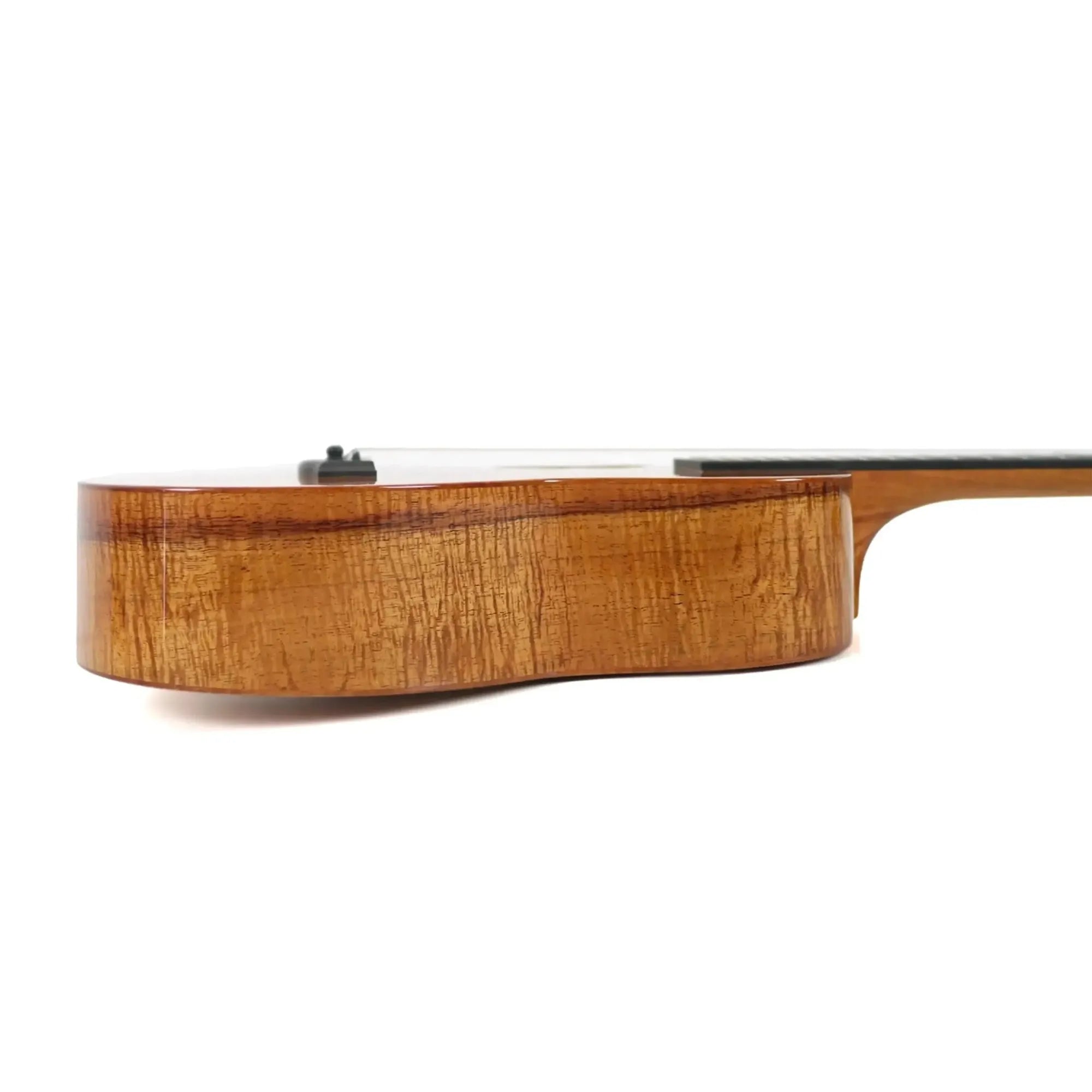 Side view of a Kanile'a D-1 Pro Premium Tenor Ukulele, showcasing its Hawaiian koa body with UV gloss finish.