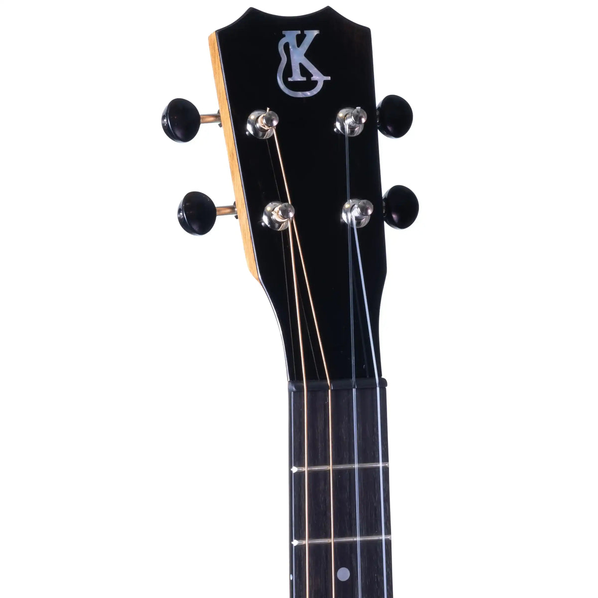 Example photo: an earlier Kanile'a D-1 Pro baritone, Crown headstock with mother-of-pearl logo and chrome open-geared tuners
