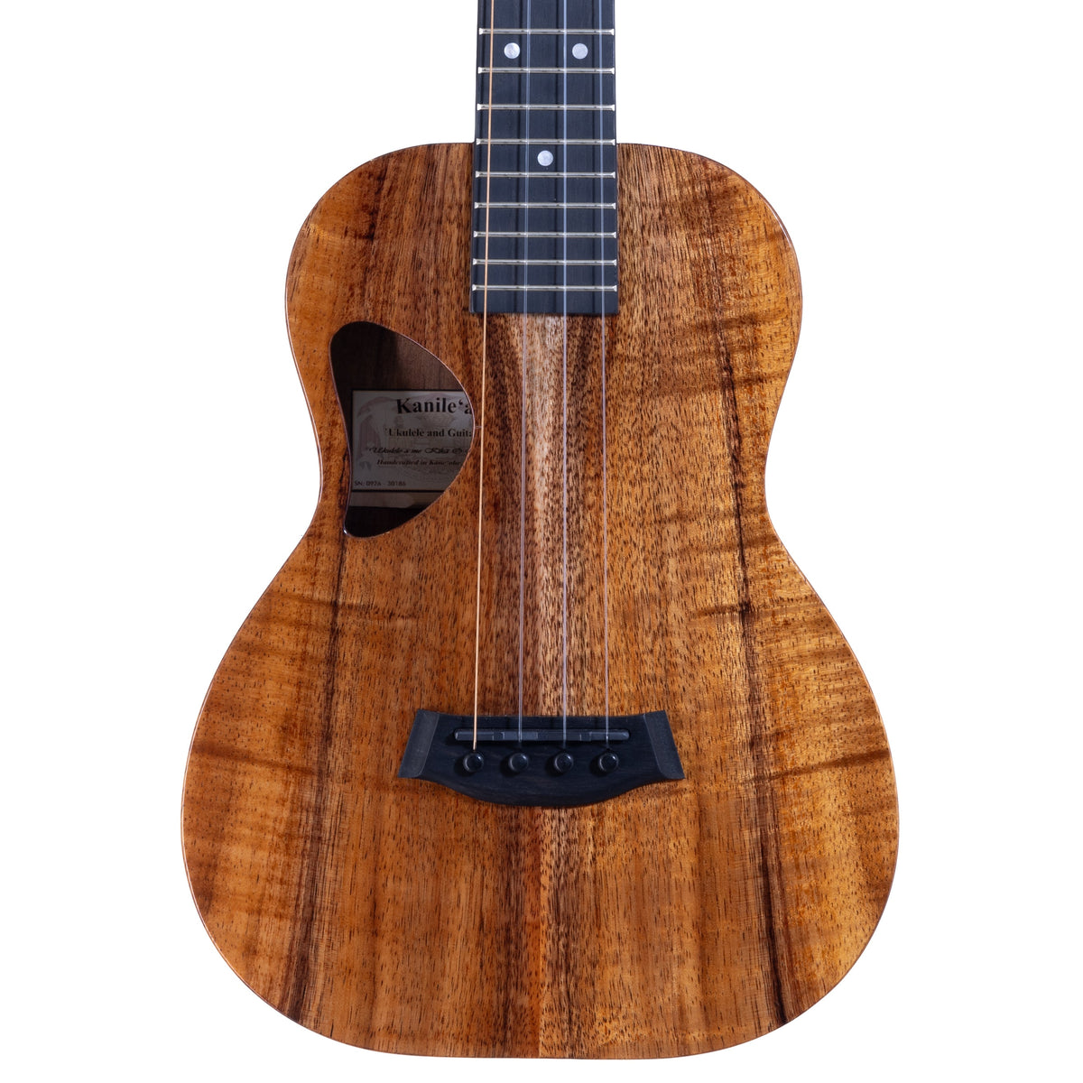 Upper bout of Kanile'a D-1 Pro tenor ukulele serial 30186 showing the koa top grain, D-shaped soundhole and oval side sound port