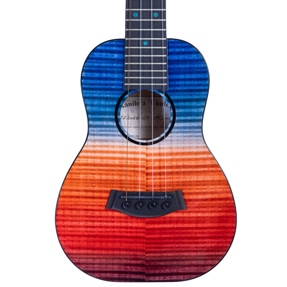 Example photo: an earlier Kanile'a 'Ilikai concert, serial 28534, body front with red to blue stained quilted maple