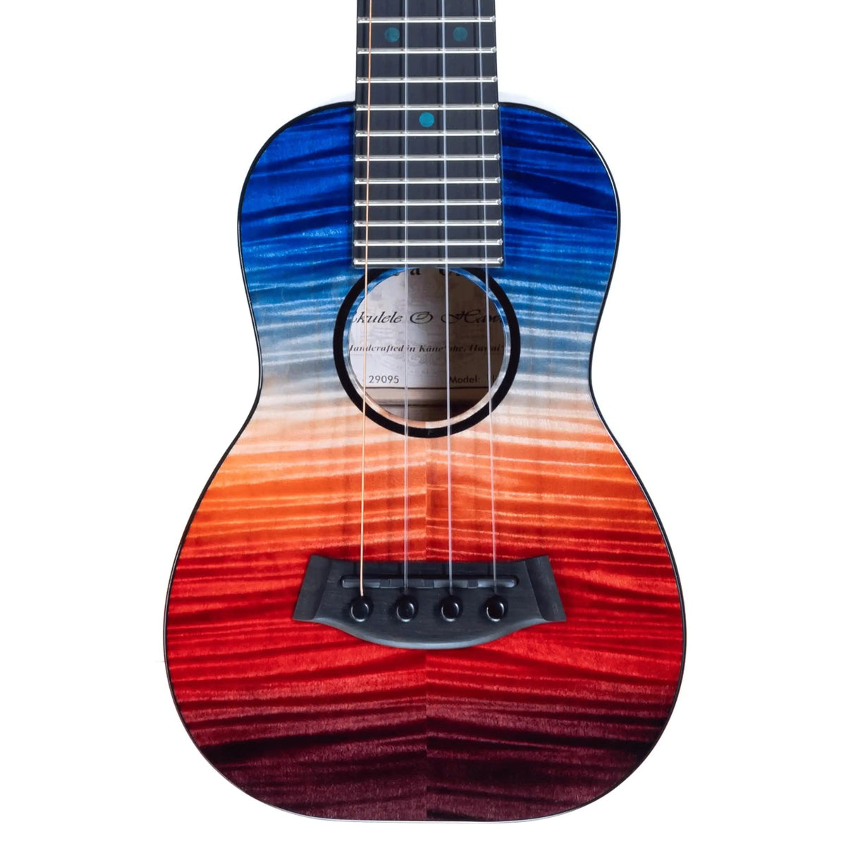 Example photo: an earlier Kanile'a 'Ilikai Pro soprano, serial 29095, body front with red to blue stained quilted maple