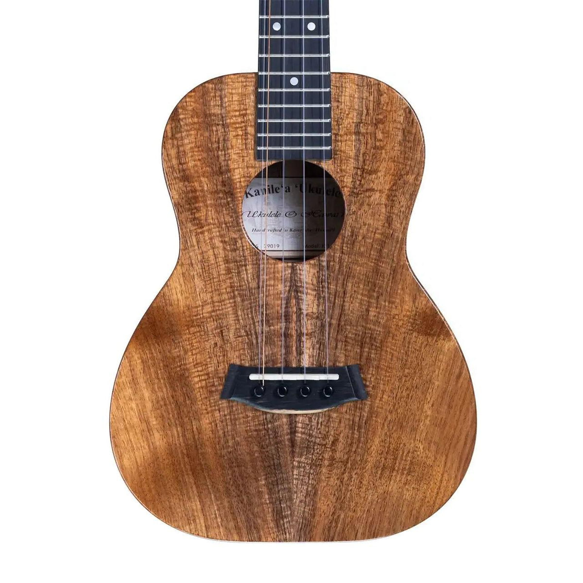 Example photo: an earlier Kanile'a K-1 Core 5-string tenor, serial 29019, body front with Deluxe Grade curly koa, round soundhole and ebony bridge
