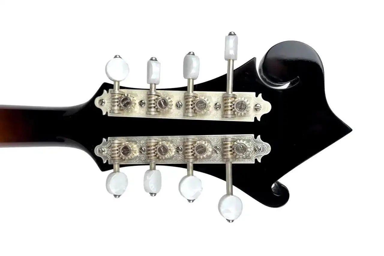 Kentucky KM-1050 F-Model mandolin headstock with silver-plated Gotoh tuners and white buttons.