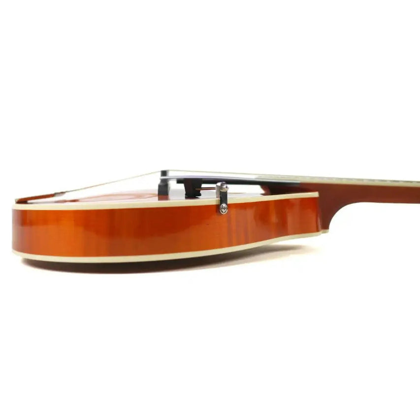 Side view of a Kentucky KM-272 Amber Deluxe A-Model Mandolin with white binding and rosewood bridge.