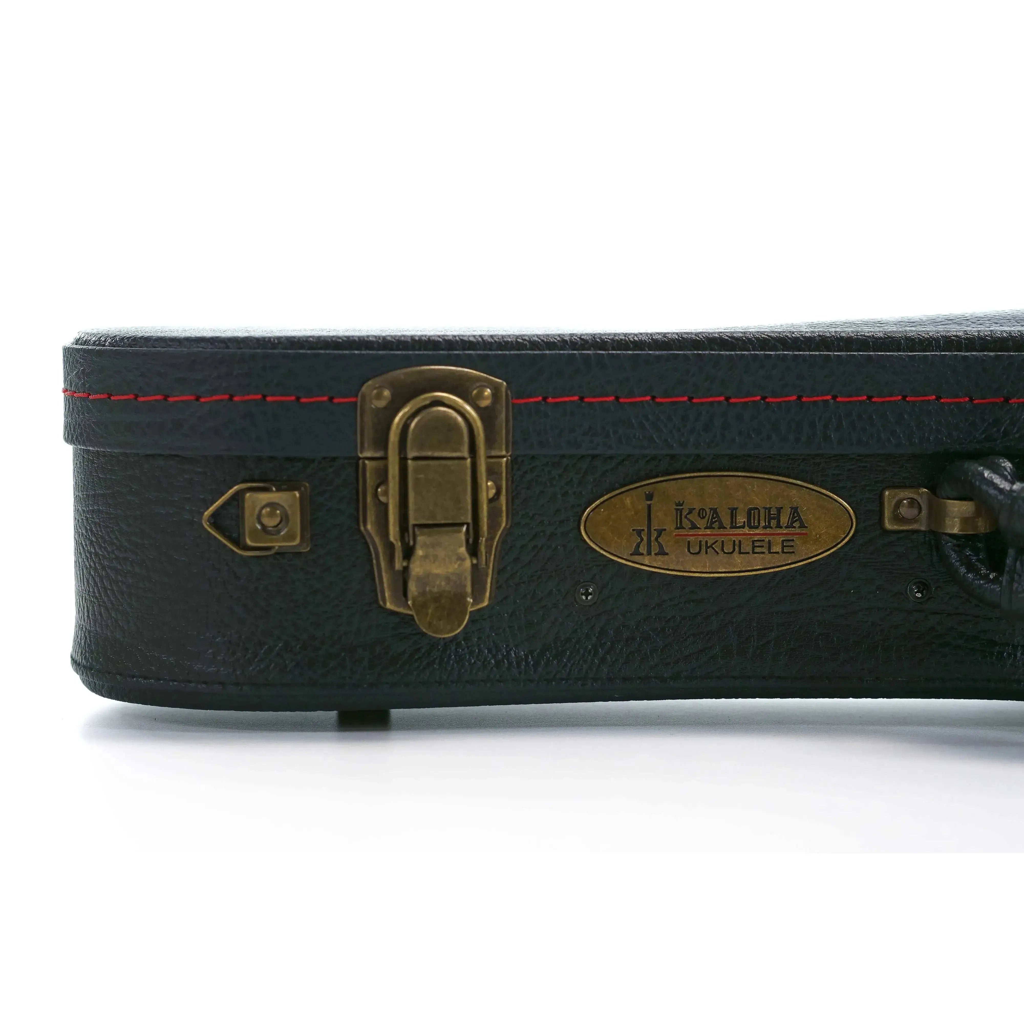 KoAloha black tolex soprano ukulele hardshell case with vintage aged brass latch and logo plate.