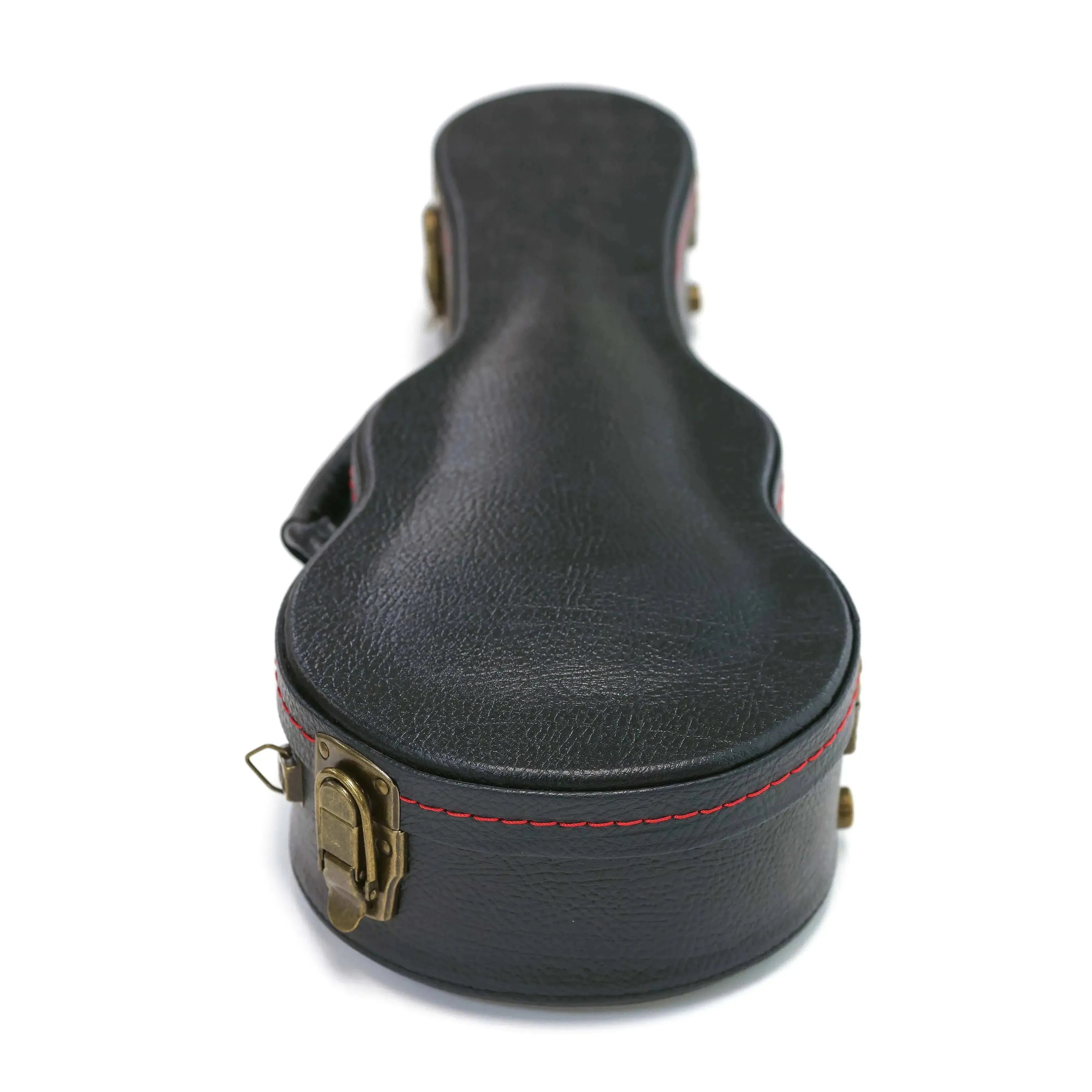 KoAloha black tolex archtop soprano ukulele hardshell case with vintage brass latches and red stitching.