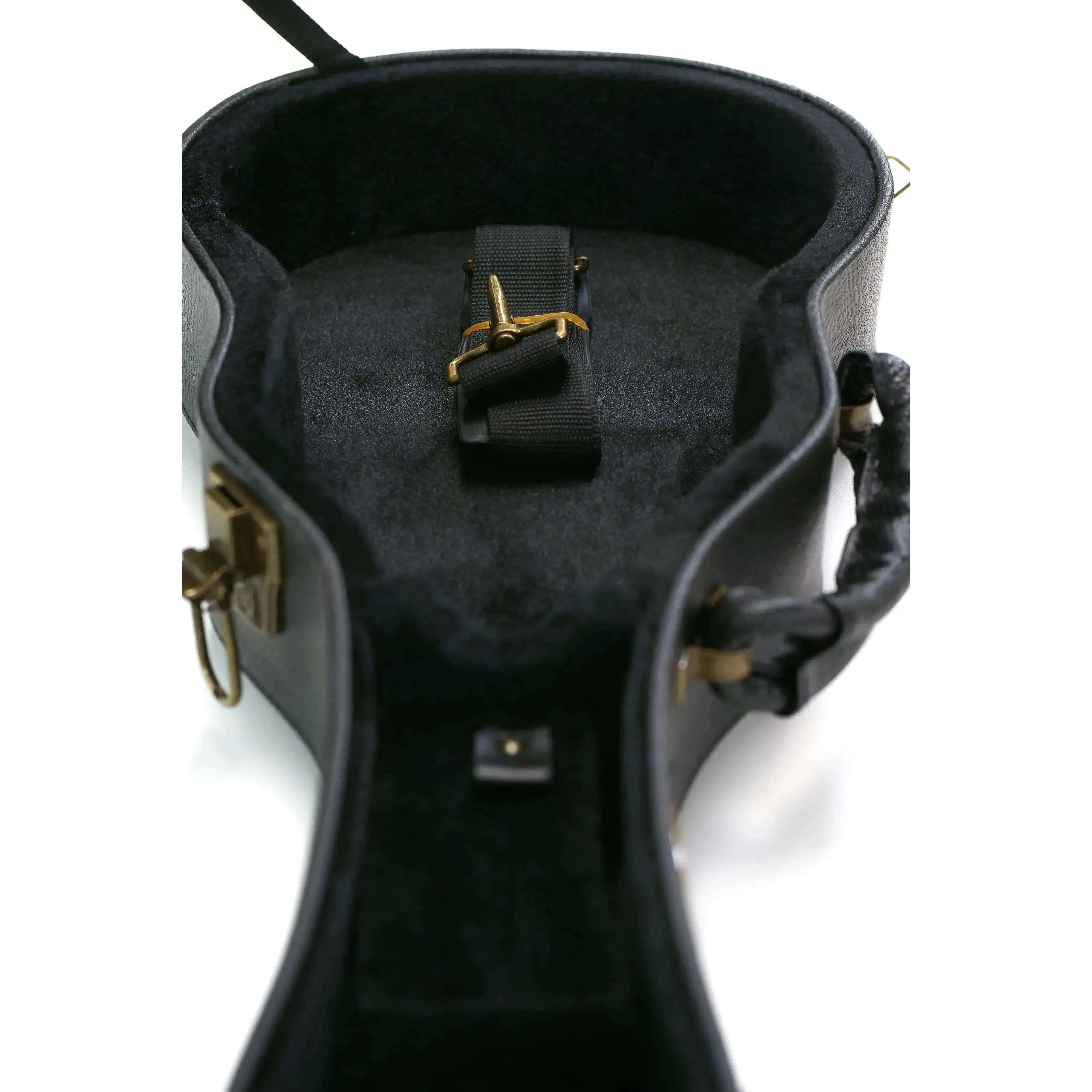 KoAloha black tolex wood archtop tenor ukulele hardshell case with vintage brass latches and plush interior.