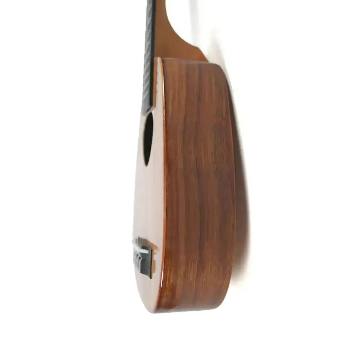 Side view of the KoAloha #25 KSM-03 25th Anniversary Pineapple Soprano Longneck Ukulele standing upright