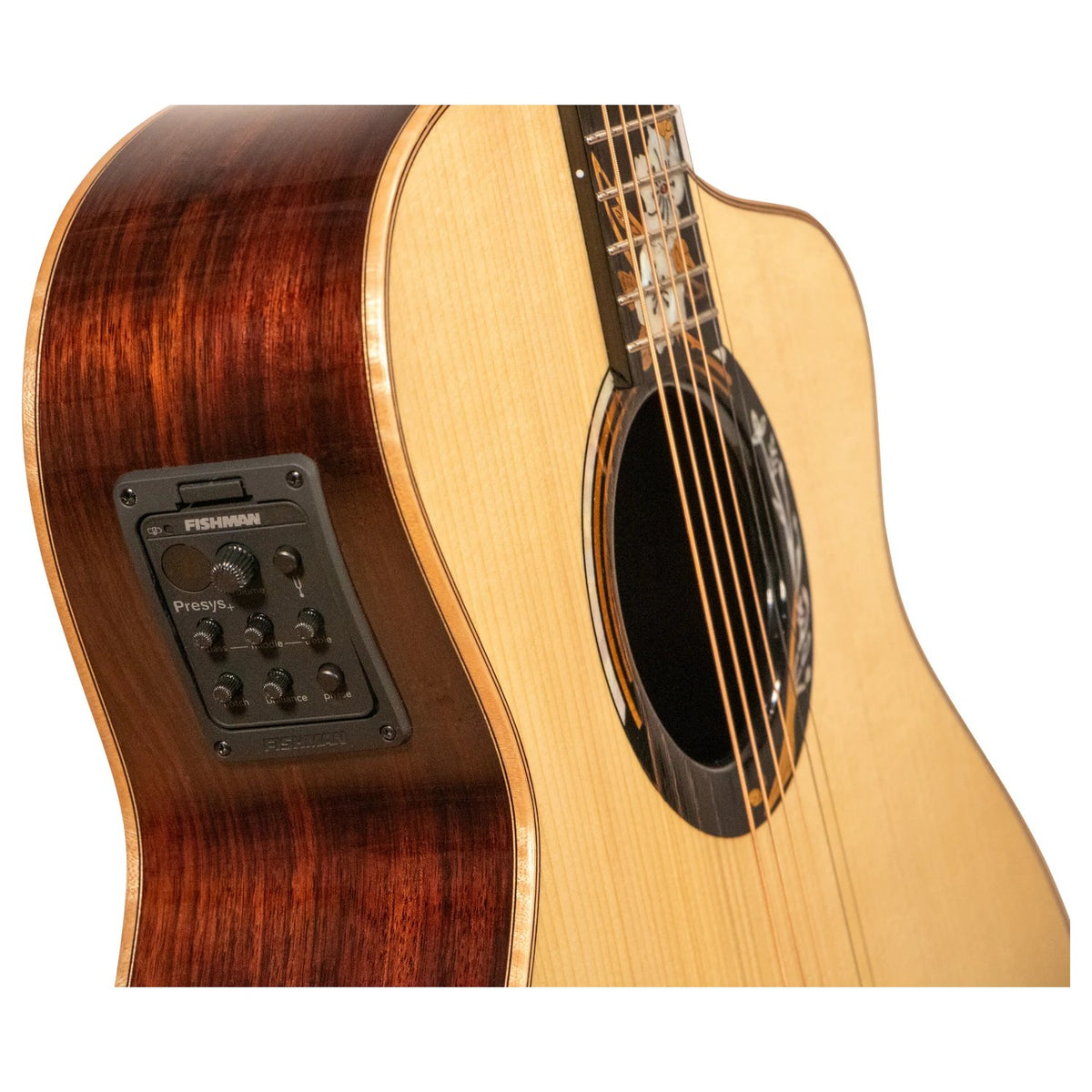Fishman preamp mounted on the upper bout of the Mérida WINTER-EQ beside the soundhole, over reddish-brown rosewood sides.