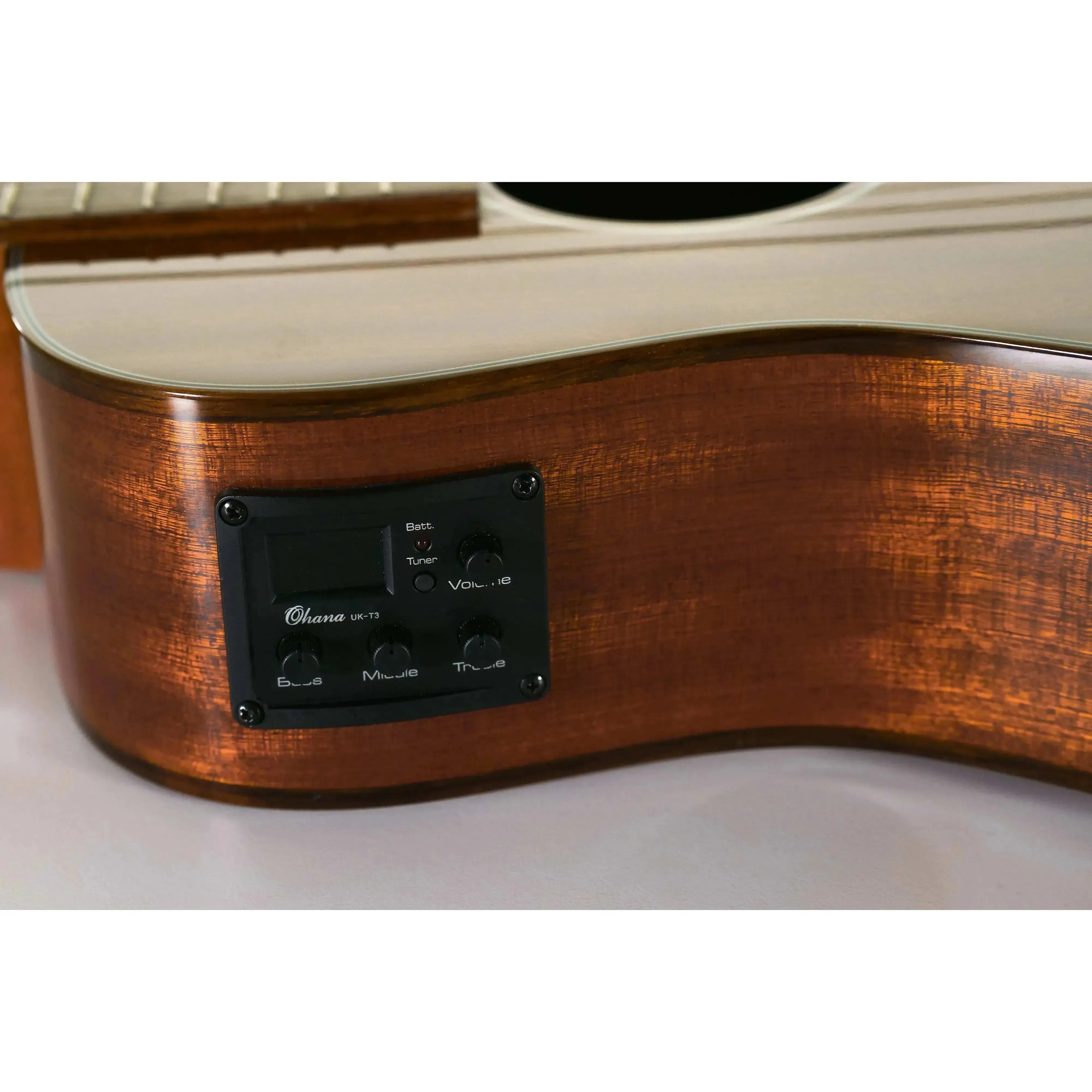 Close-up of Ohana BK-35GCE Baritone Ukulele's solid mahogany body with active pickup system.