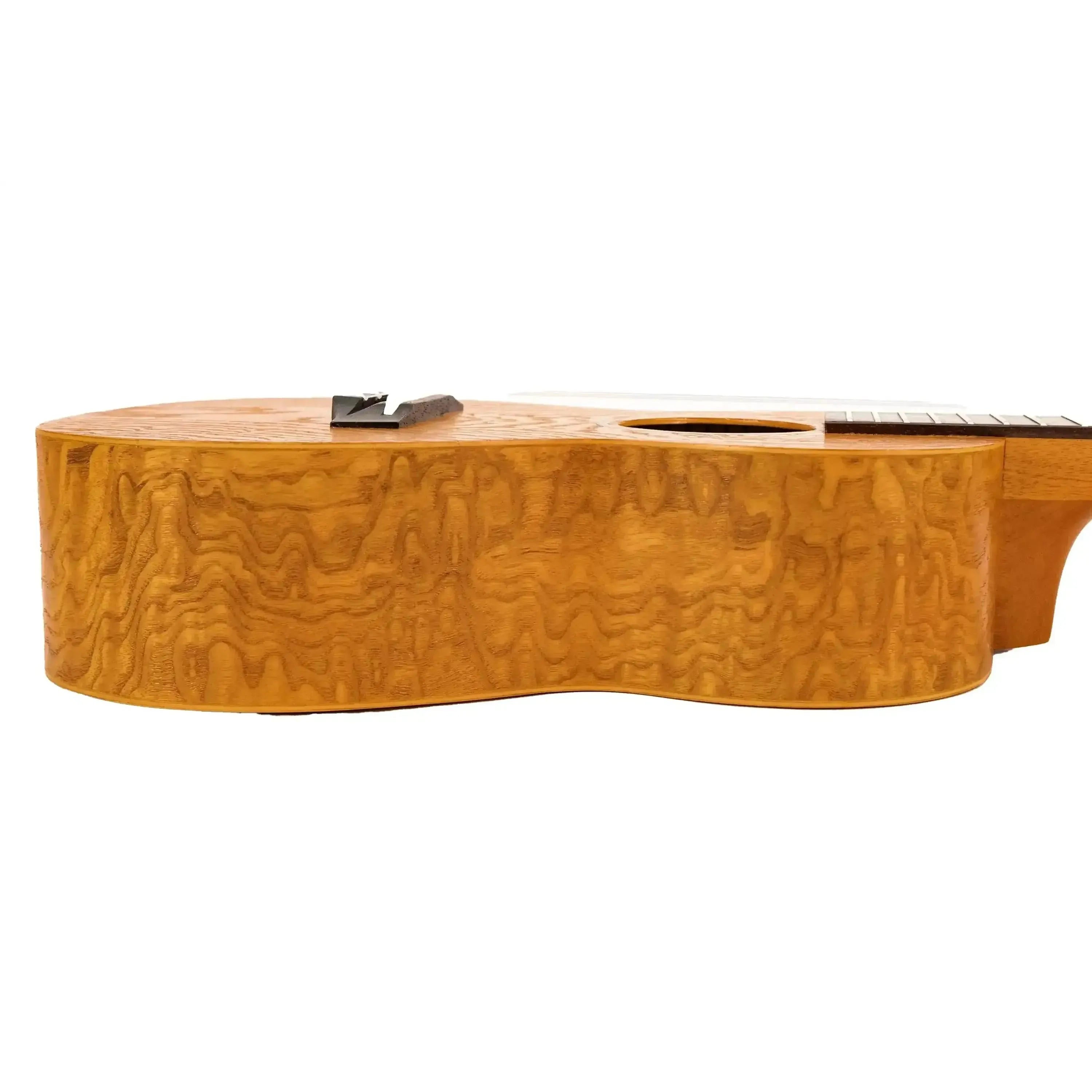 Ohana CK-15W Willow Concert Ukulele body, showing its light brown wood grain and ribbon soundhole.