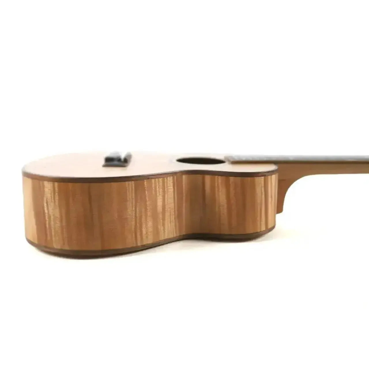 Ohana CK-18OM Concert Ukulele, light brown exotic okoume wood, side view showing body and neck.
