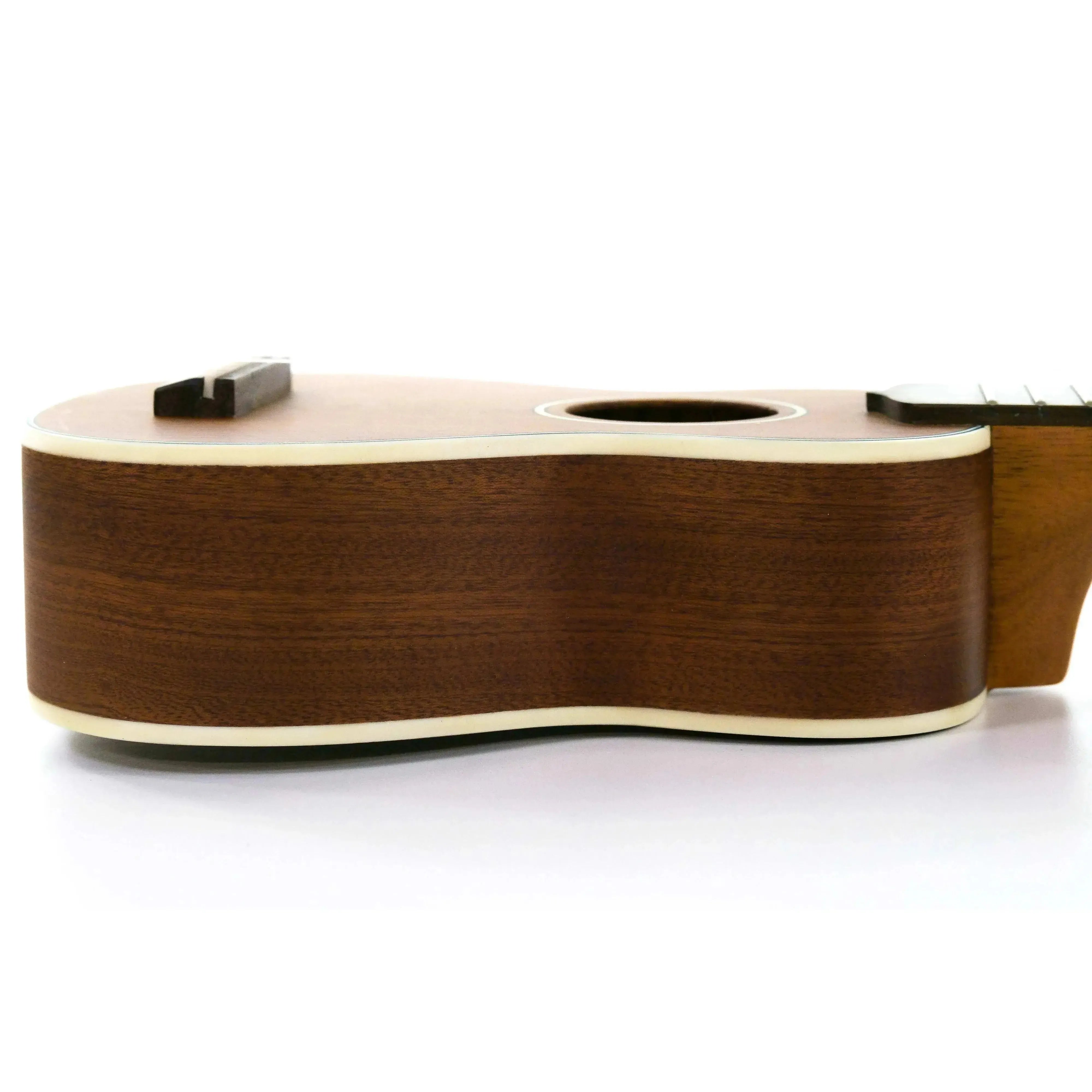 Ohana O'Nino Sopranissimo Ukulele, side view, showing its solid mahogany body and satin finish.