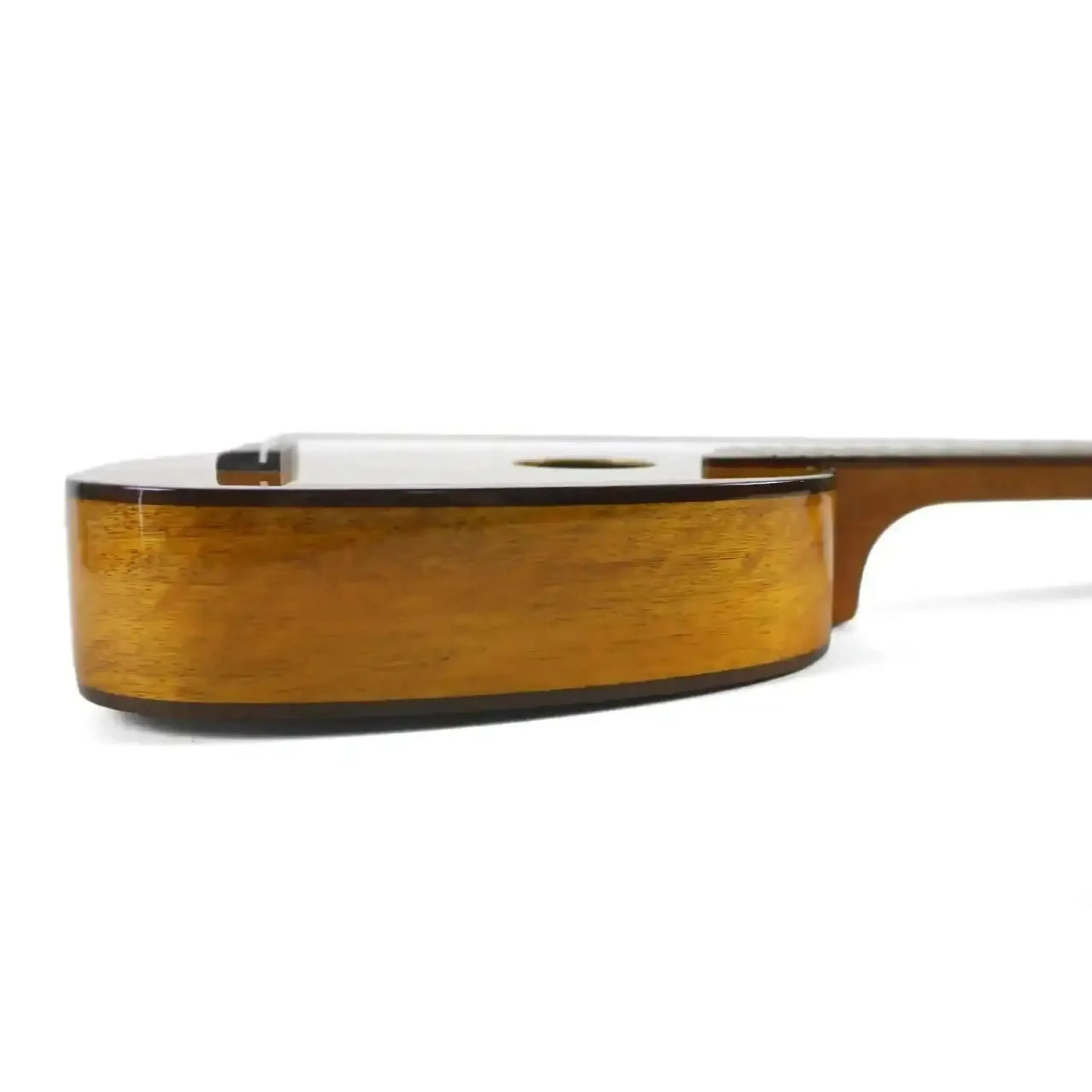 Side view of Ohana PK-220G Solid Mango Pineapple Soprano Ukulele body with gloss finish.
