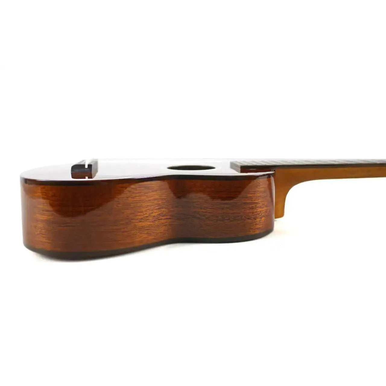 Ohana SK-35G soprano ukulele, side view, showing gloss solid mahogany body and neck.