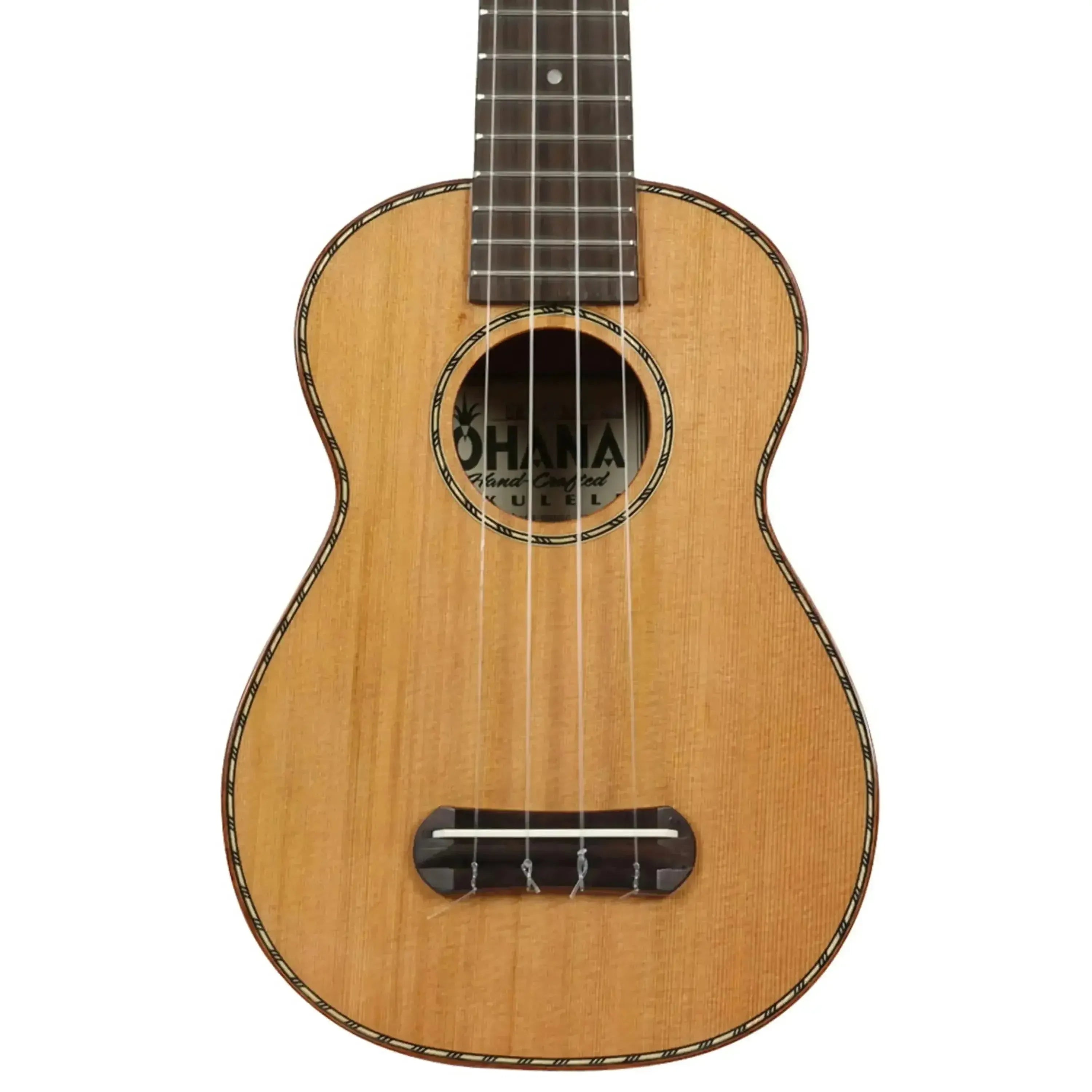 Ohana SK-50WG soprano ukulele with a light wood cedar top, dark soundhole rosette, and gloss finish.