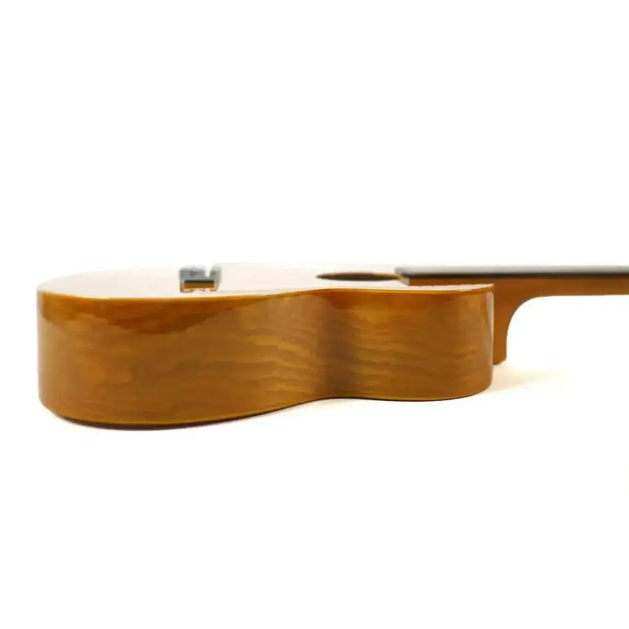 Ohana TK-15WG Willow Wood Tenor Ukulele, side view showing the light brown wood grain and gloss finish.