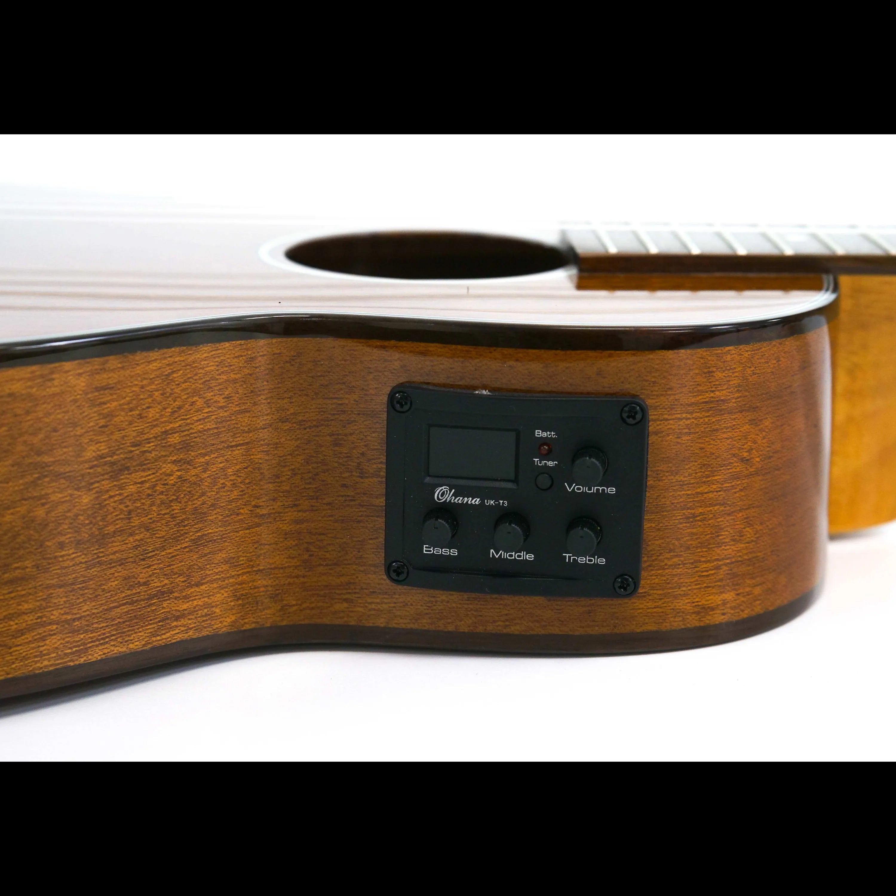 Close-up of a left-handed Ohana TK-35GCE-LH tenor ukulele's mahogany body with built-in EQ controls.