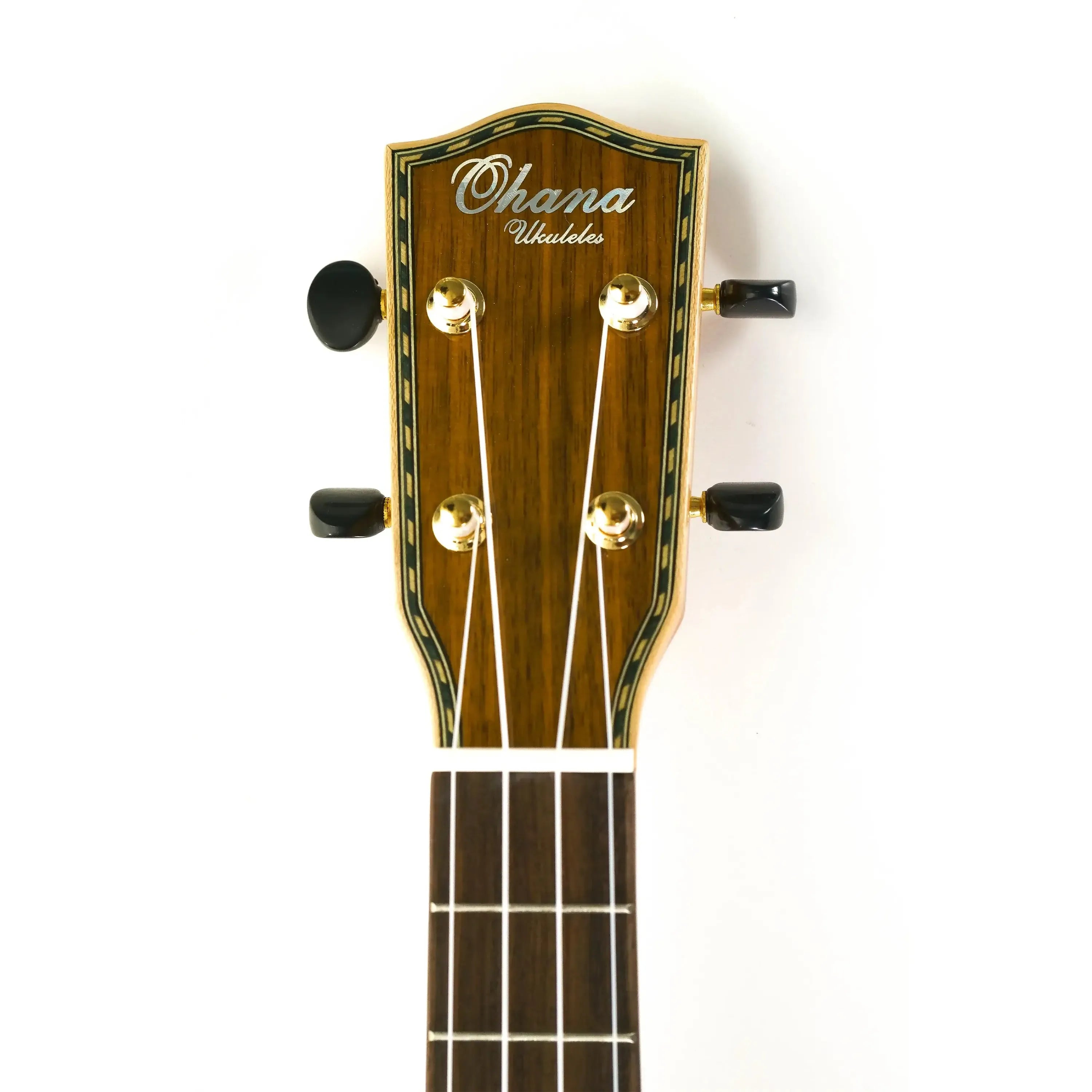 Ohana TK-43 Tenor Ukulele headstock with maple binding, gold tuners, and "Ohana Ukuleles" logo.