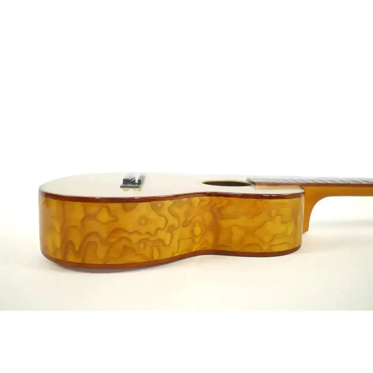 Ohana TK-70WG tenor ukulele side view, showing light spruce top, warm willow wood grain, and mahogany binding.