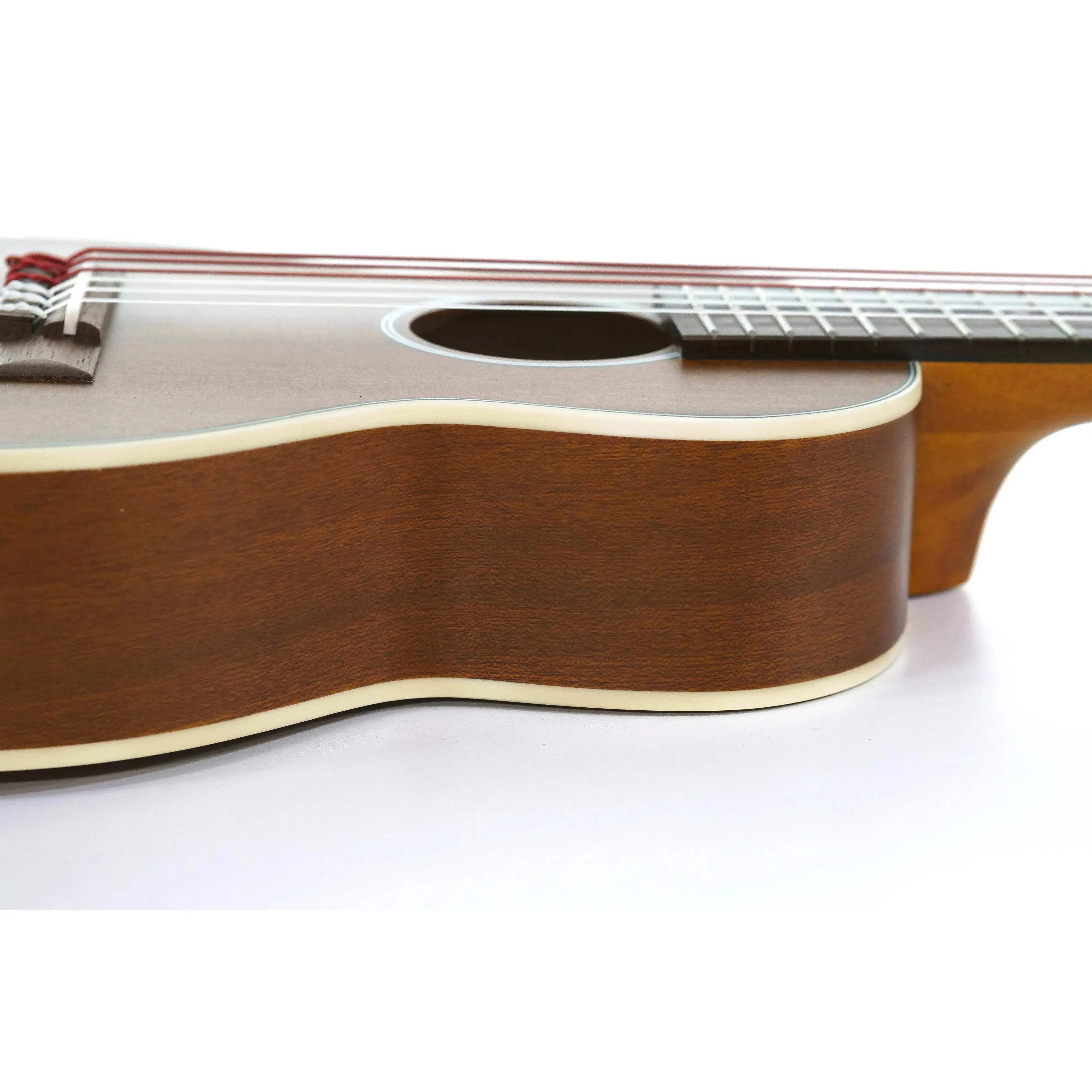 Ohana TKG-20 Mahogany Mini-Guitar body with cream binding, soundhole, and fretboard.