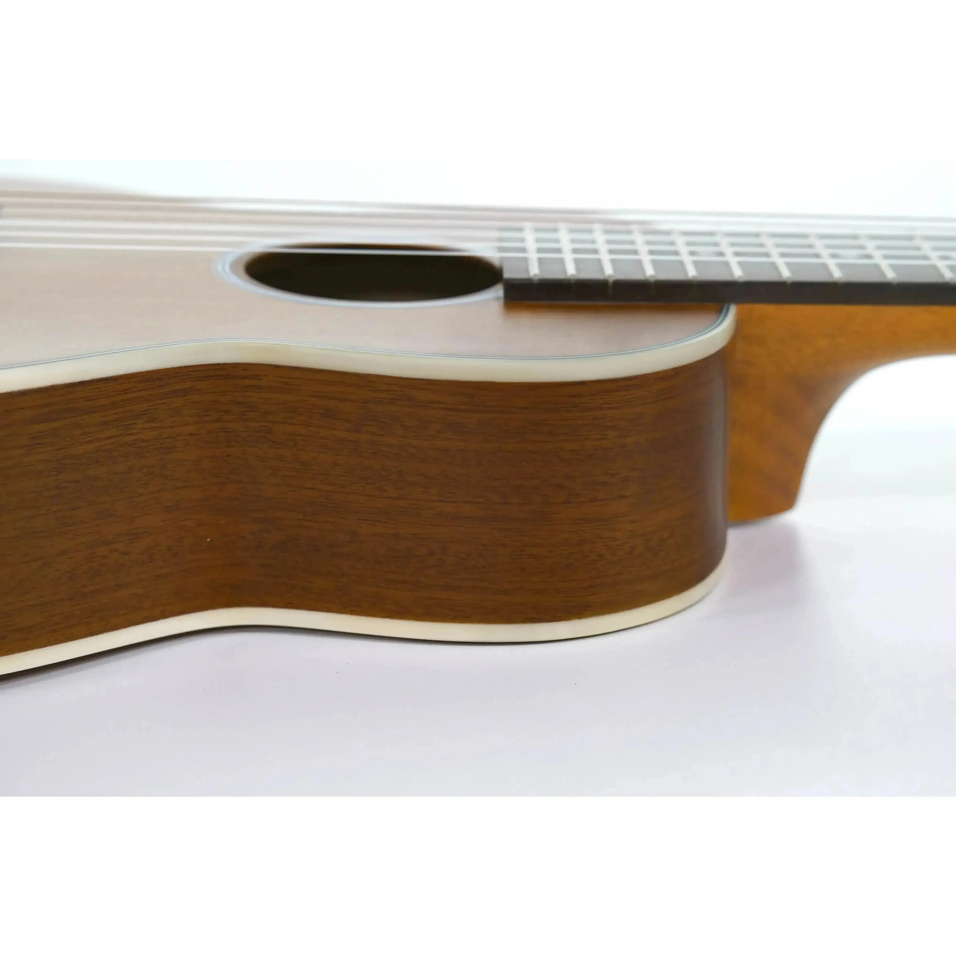 Ohana TKGL-20 solid mahogany top guitarlele body with cream binding and sound-hole.