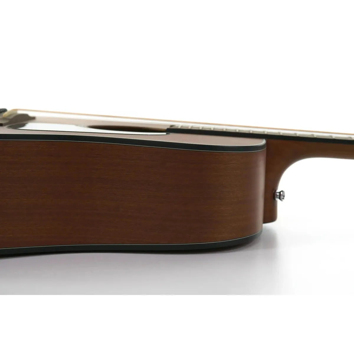 Takamine GD11M NS acoustic guitar side view, showing the warm brown Sapele body and black binding.