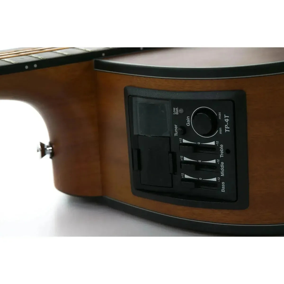 Close-up of Takamine GD11MCE-LH acoustic electric guitar's TP-4T preamp on a sapele body.